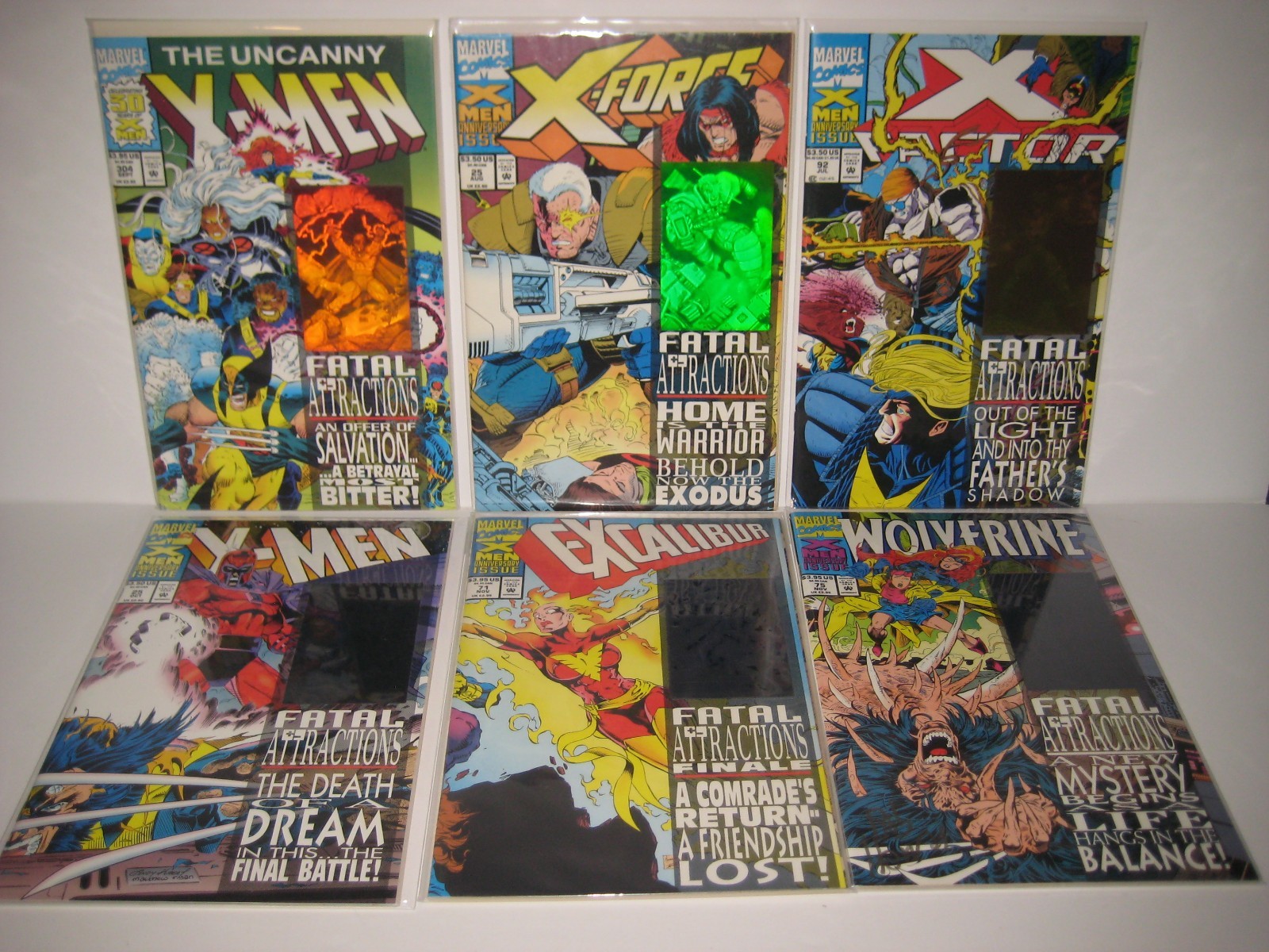 X-Men FATAL ATTRACTION WOLVERINE 75 X-MEN 25 UNCANNY 304 1993 HOLOGRAM SET X-Men FATAL ATTRACTION WOLVERINE 75 X-MEN 25 UNCANNY 304 1993 HOLOGRAM SET