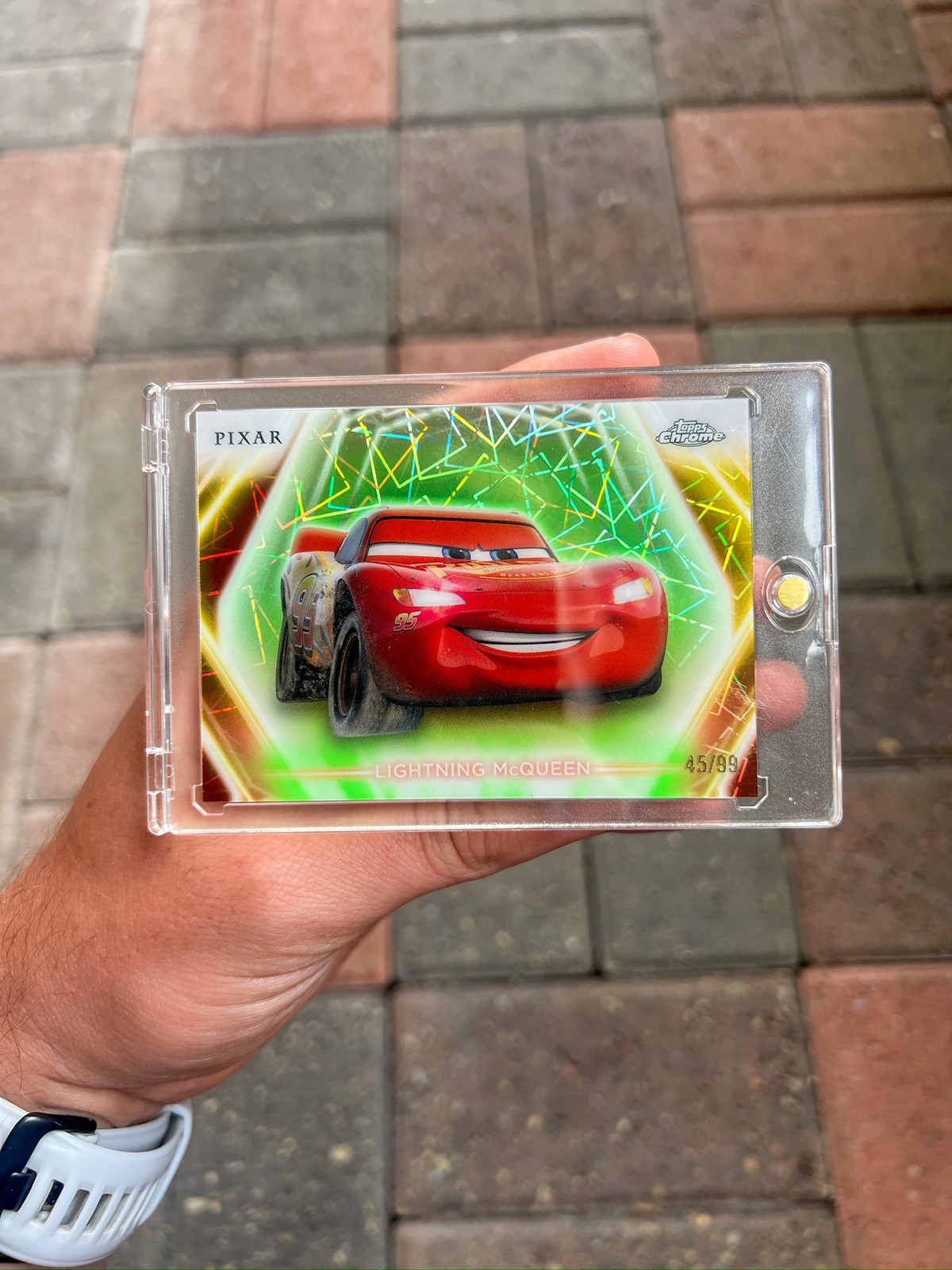 2026 Topps Disney Neon Chrome Pixar Lightning McQueen Refractor /99 2026 Topps Disney Neon Chrome Pixar Lightning McQueen Refractor /99