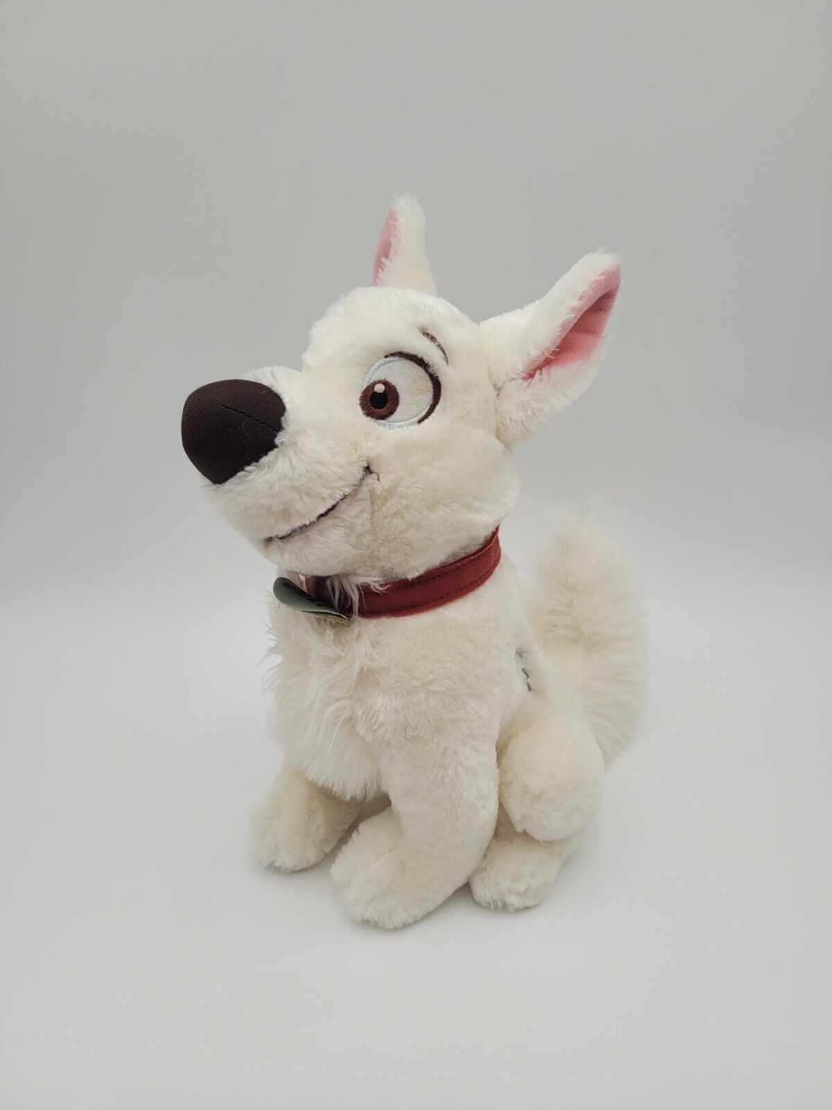 Disney Bolt Dog Plush Stamp White Lightning Sitting Fuzzy Puppy Park Exclusive