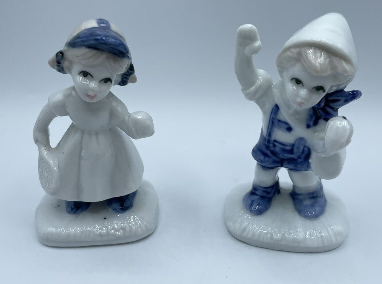 Vintage Pair Of Blue and White Painted Dutch Boy and Girl Figurines - Sports