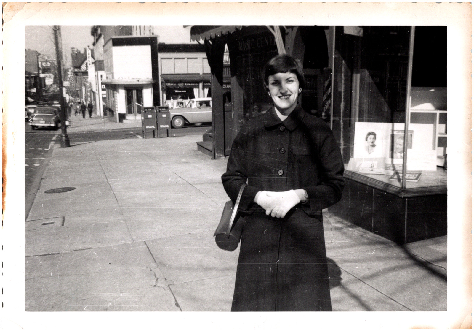 Woman in Unknown City, Music Center & Jack Coiffure Design 1950s Vintage Photo
