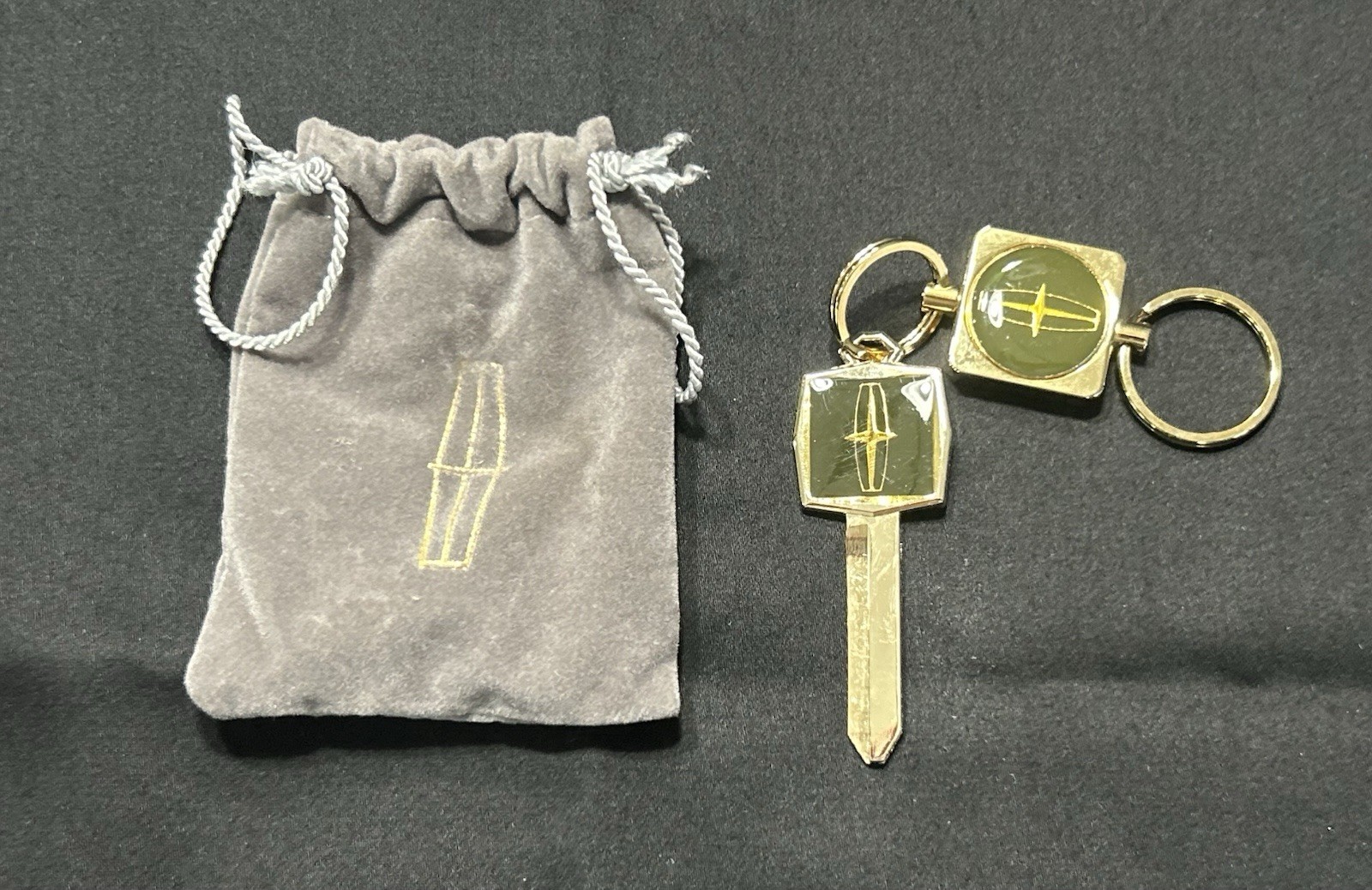 Vintage Lincoln Continental Uncut Key & Fob, Gold and Green, Original Bag Vintage Lincoln Continental Uncut Key & Fob, Gold and Green, Original Bag