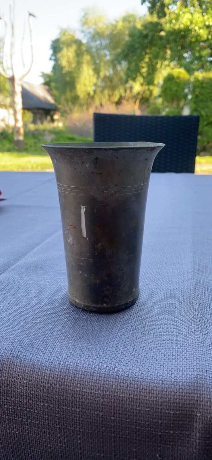 Antique brass cup