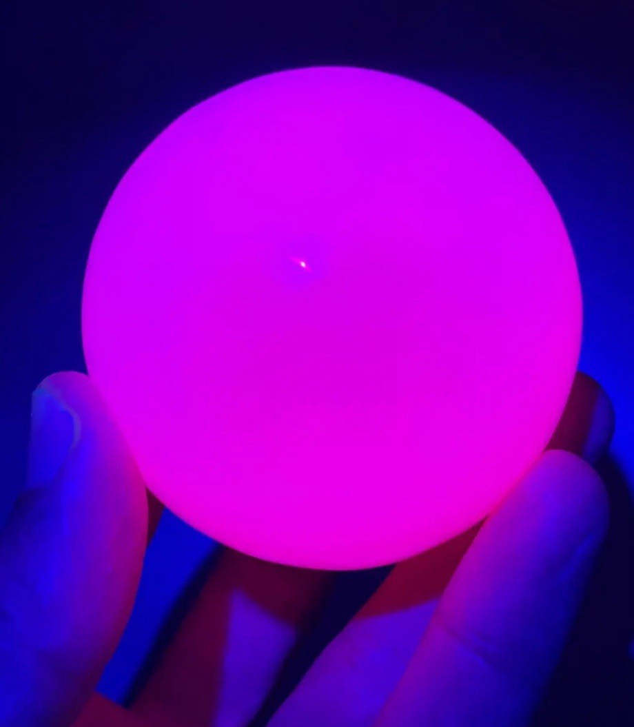 Pink Mangano Calcite Sphere UV Reactive Fluorescent Glow Polished Mineral