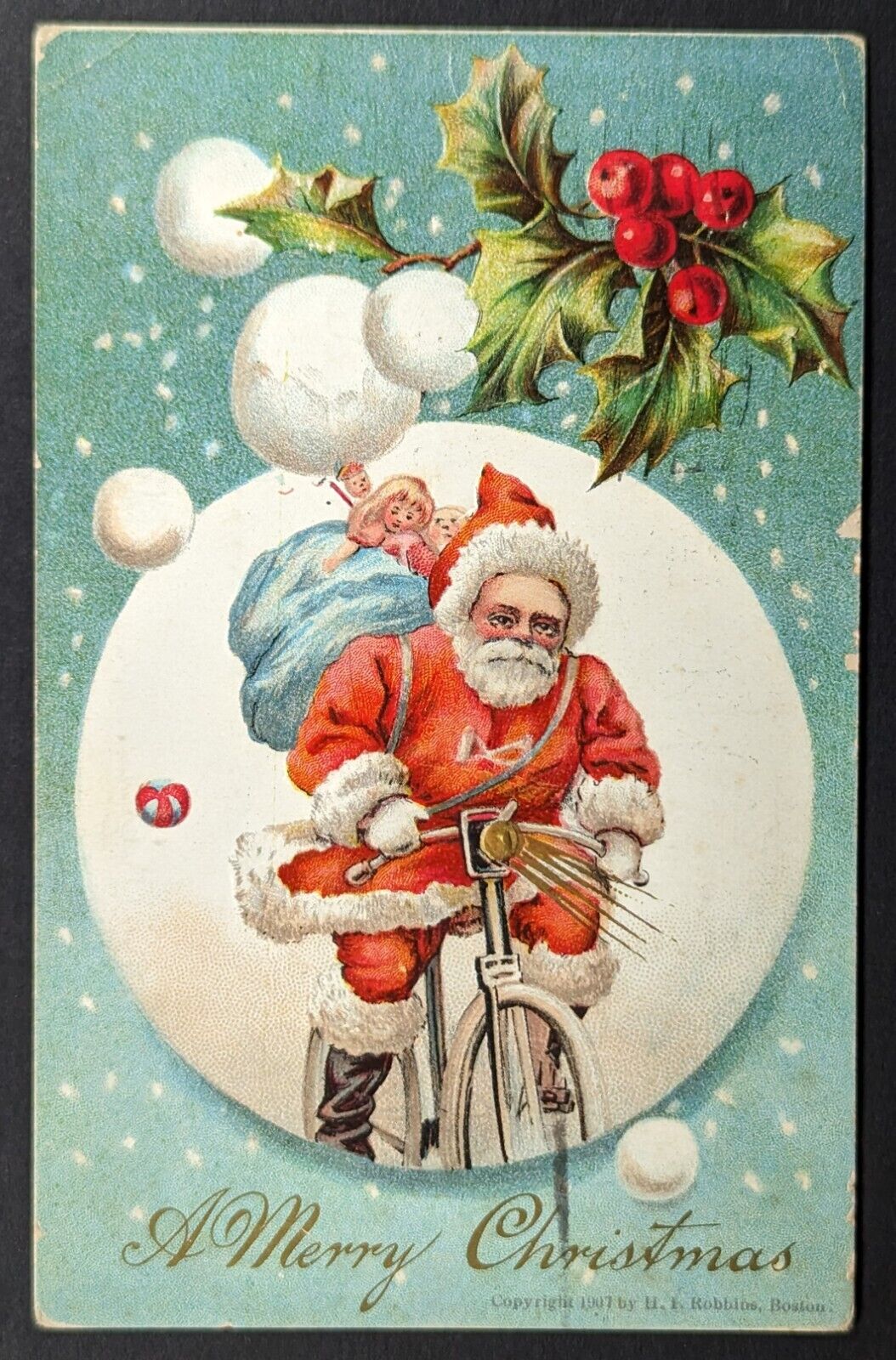 Vintage 1907 Christmas Santa on Bicycle Postcard
