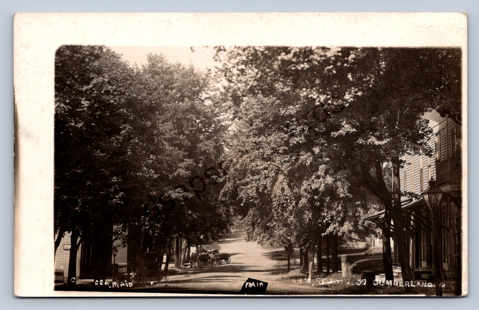 J87/ Cumberland Ohio RPPC Postcard c1910 Cambridge Main St Residences 1877