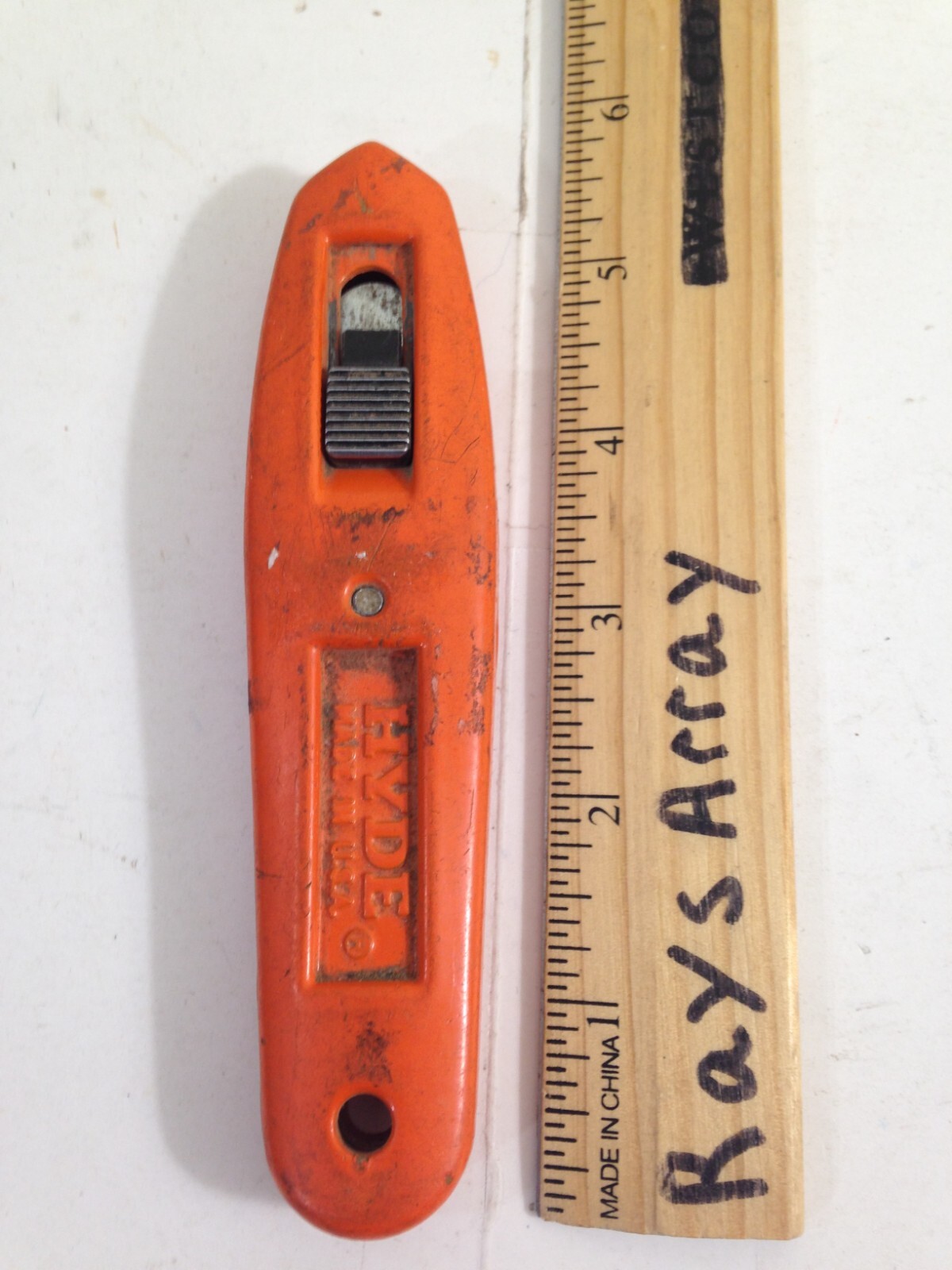 AMBIDEXTROUS  HYDE UTILITY KNIFE ORANGE SPRING RETRACTABLE PAT 4139939 & 5012581