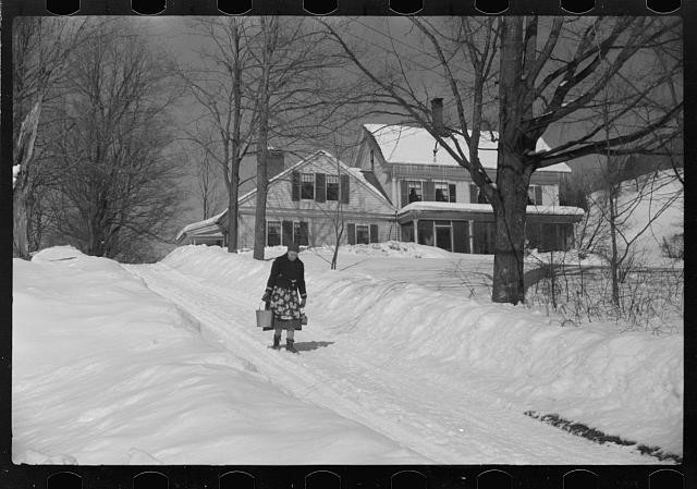 Woodstock Vermont 1939 1940 woman hauling water in deep snow farm house