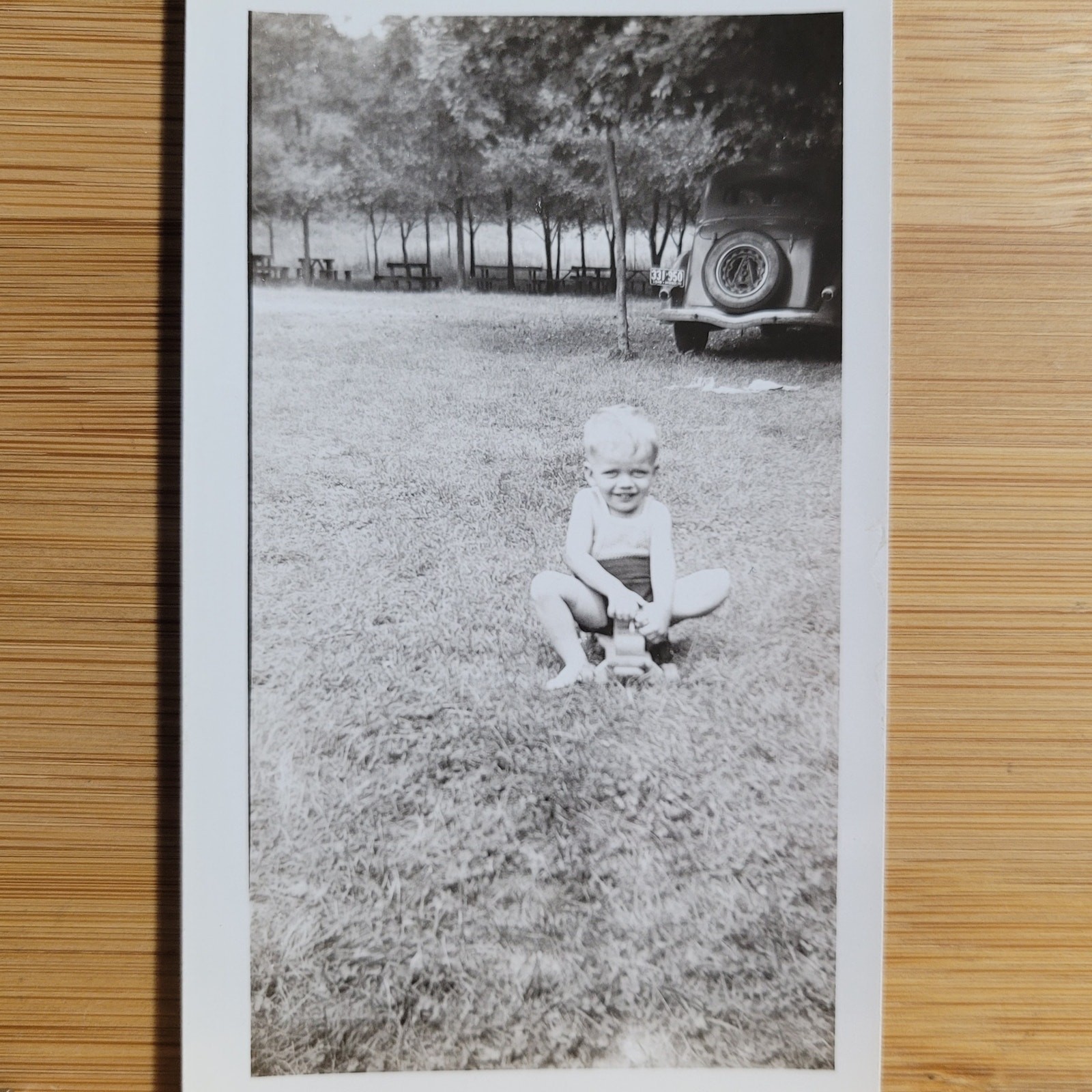 4 Vintage B&W photos Young Boy outside at play 2.75”x4.5” approx. June 1946