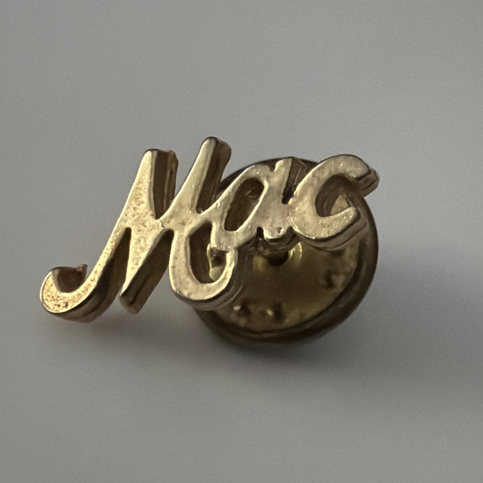 MAC Cosmetics Gold Tone Script Logo Employee Promotional Lapel Pin Tie Tack