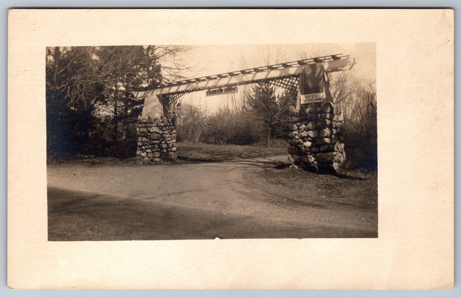 RPPC Fairview Inn Entrance Gate Stone Pillars Roadside Inn Real Photo Postcard