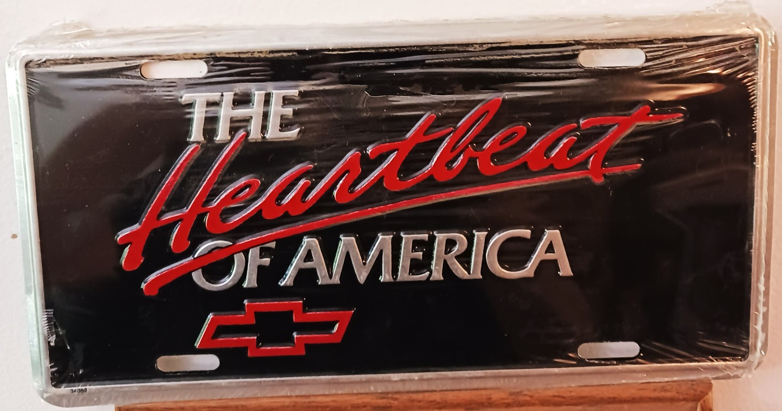 Vintage NOS Heartbeat of America Chevrolet Booster License Plate Black & Silver Vintage NOS Heartbeat of America Chevrolet Booster License Plate Black & Silver