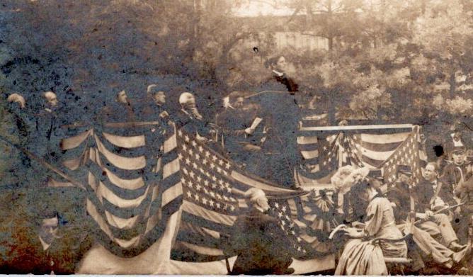 1910's RPPC PATRIOTIC POLITICAL SPEECH? AMERICAN FLAGS BUNTING BAND MUSICIANS