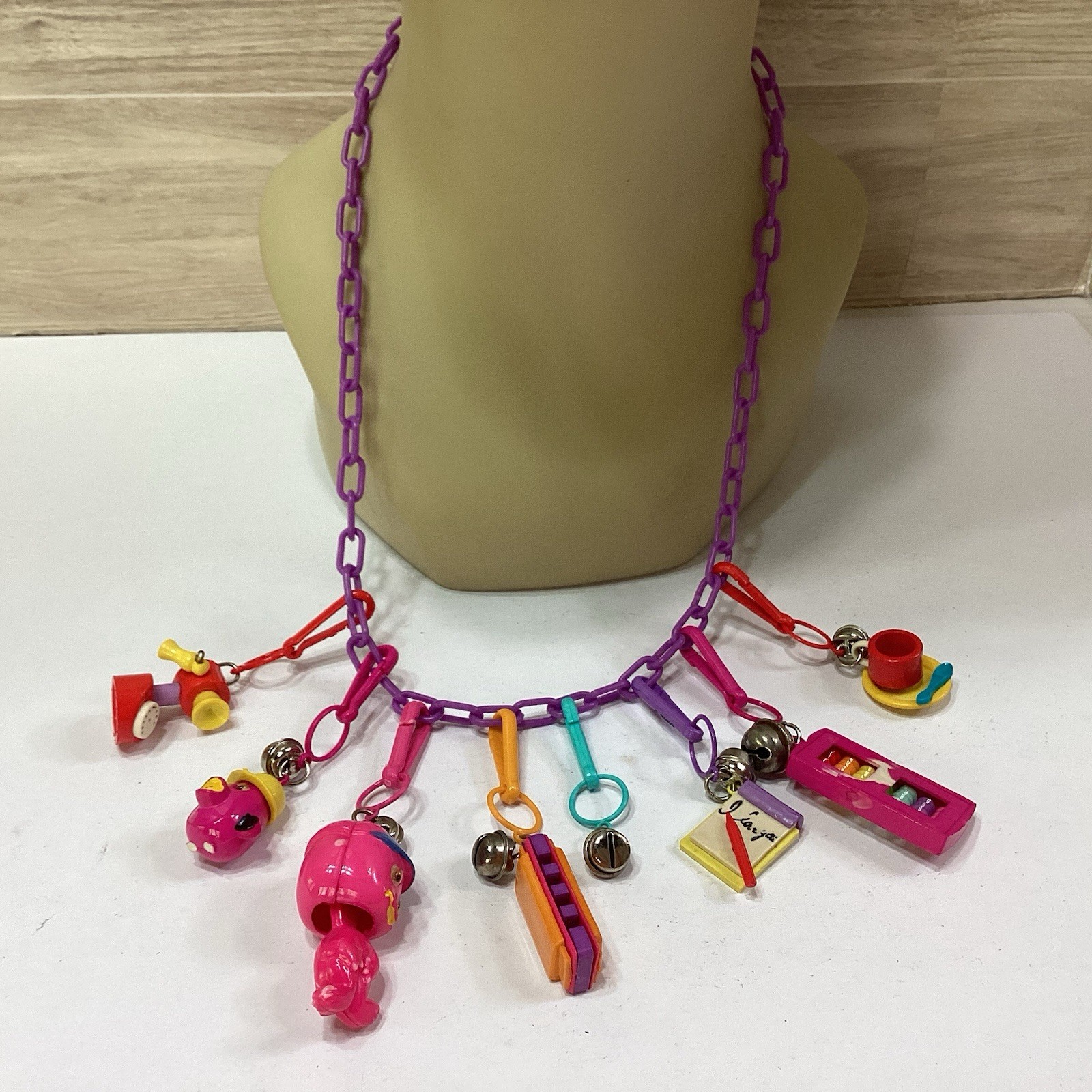 Vintage 1980s Plastic Bell Charm Necklace Pink W/ 8 Charms Vintage 1980s Plastic Bell Charm Necklace Pink W/ 8 Charms