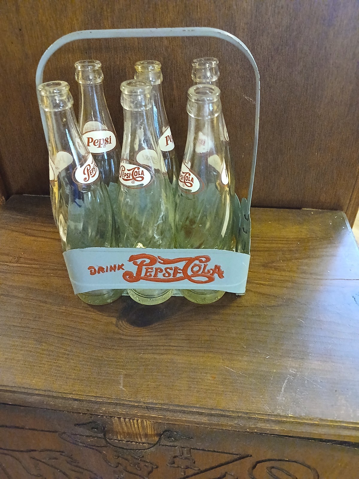 Vintage Pepsi cola carrier and bottles