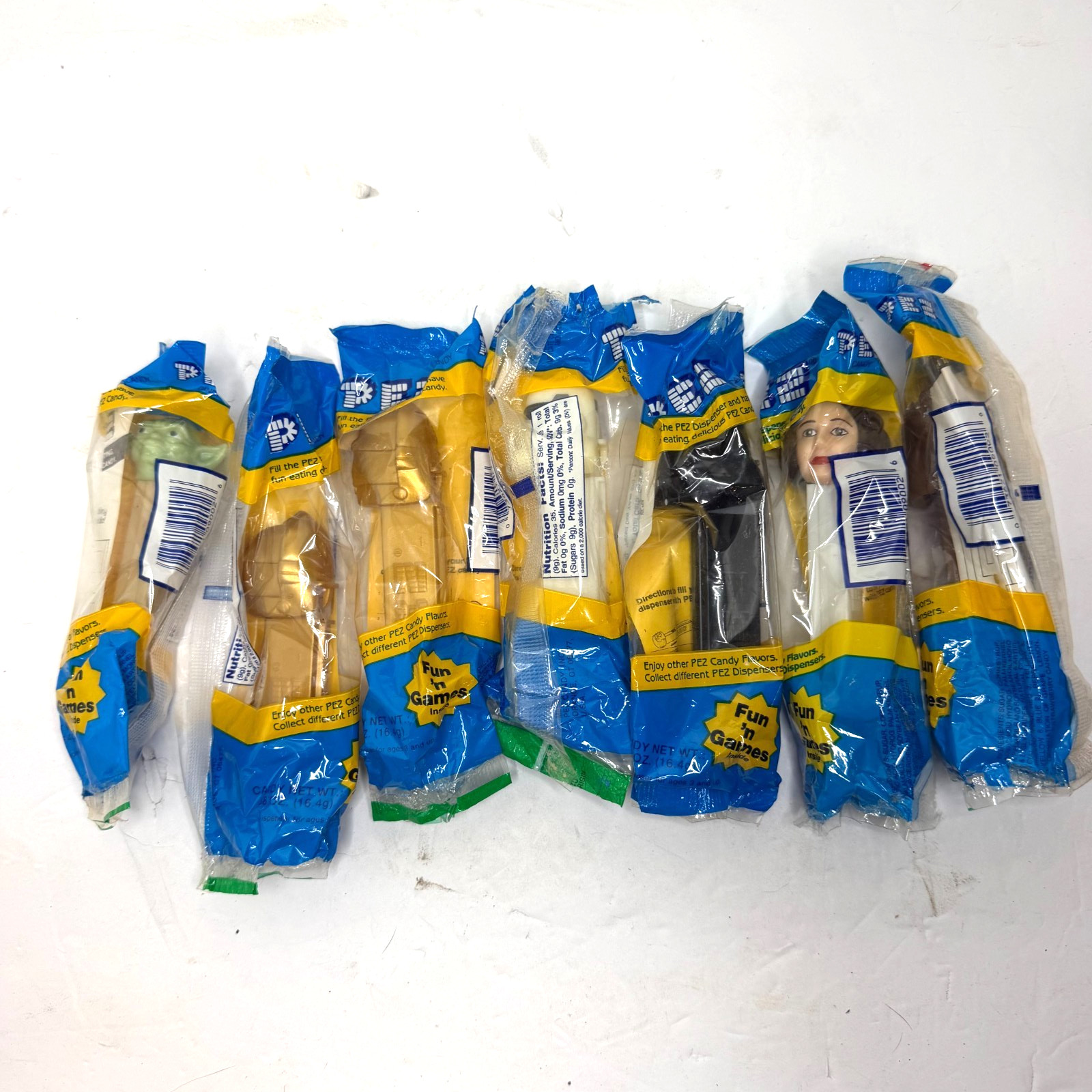 Vintage PEZ Dispensers Lot of 7 Original Bags Gold Figures Mixed - No Candy Vintage PEZ Dispensers Lot of 7 Original Bags Gold Figures Mixed - No Candy