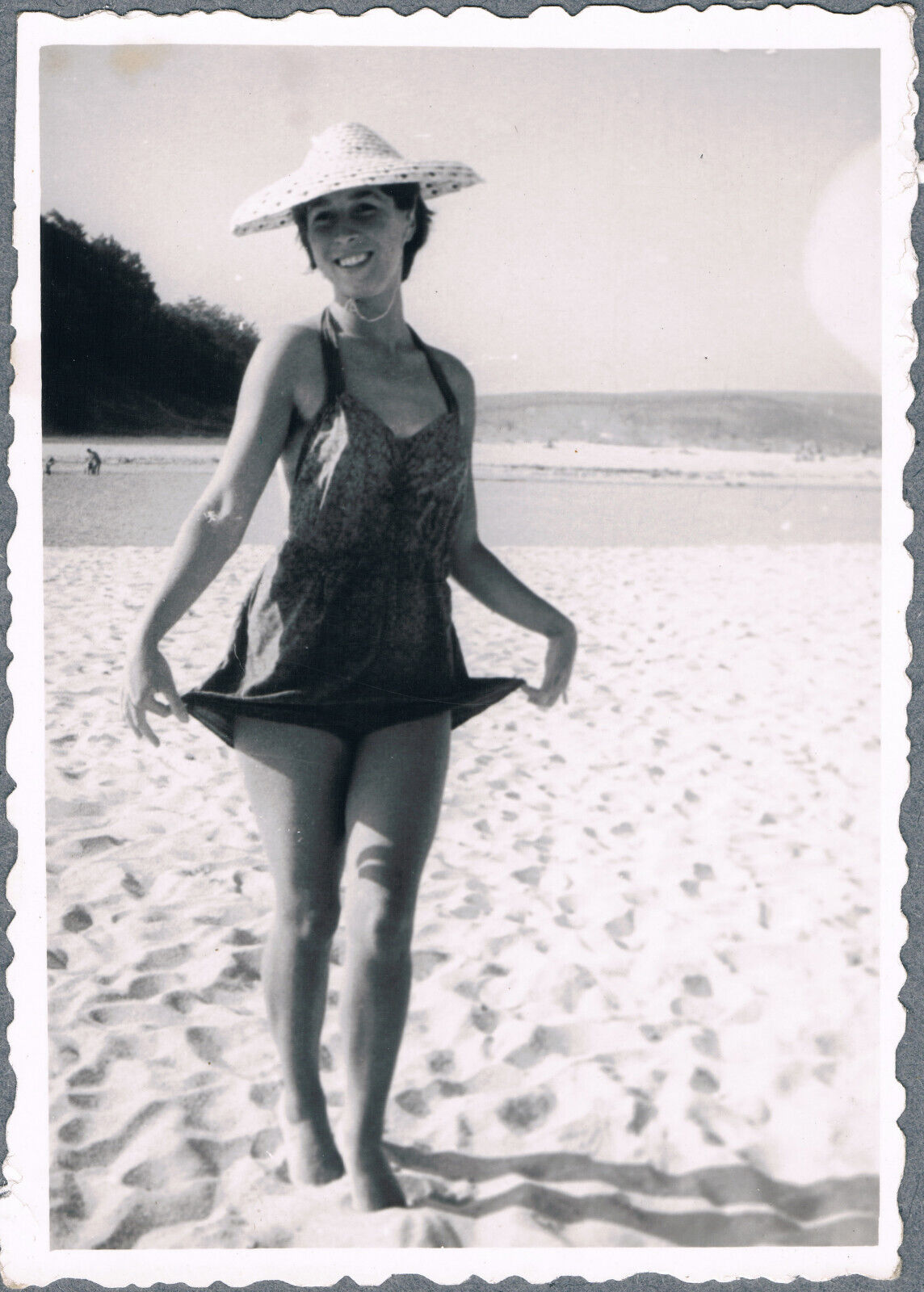 1960s Beautiful Cute Girl in a Swimsuit Resting on the Beach Vintage Photo
