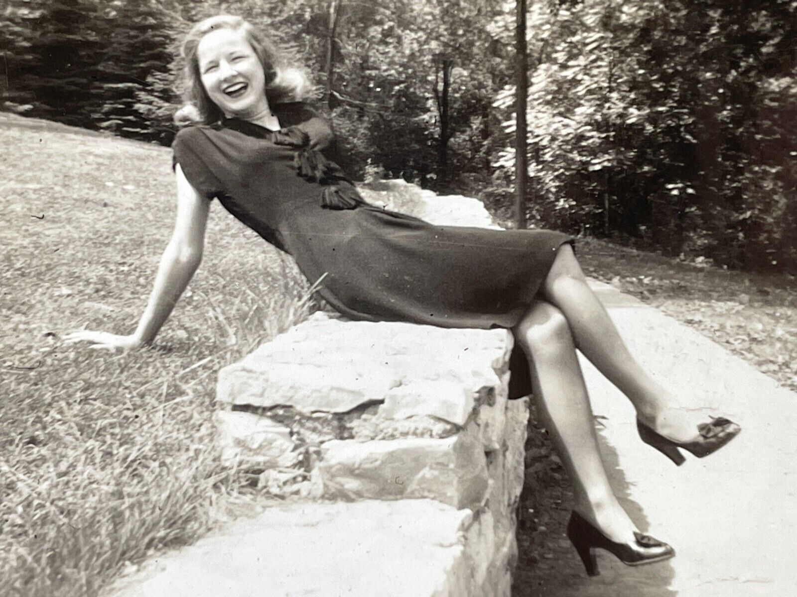 PC Photograph Beautiful Sexy Woman Sitting On Stone Wall Laughing Smiling 1940\'s