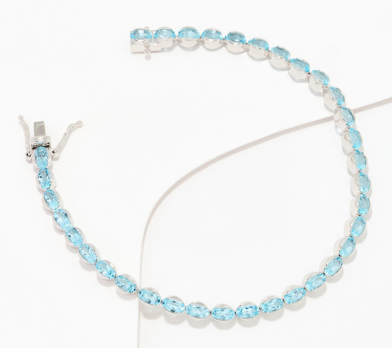 Affinity Gems Sterling Silver Oval Cut Blue Topaz Tennis Bracelet 7-1/4