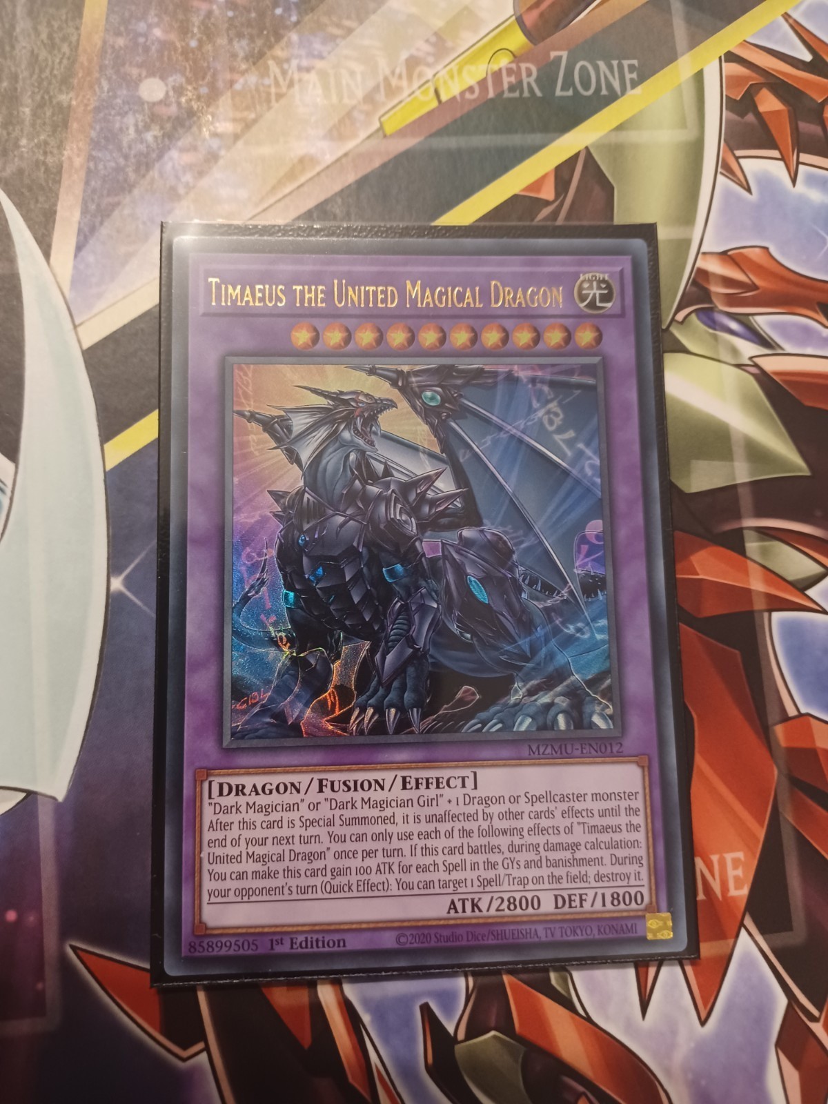 MZMU-EN012 Timaeus the United Magical Dragon Ultra Rare 1st Edition YuGiOh