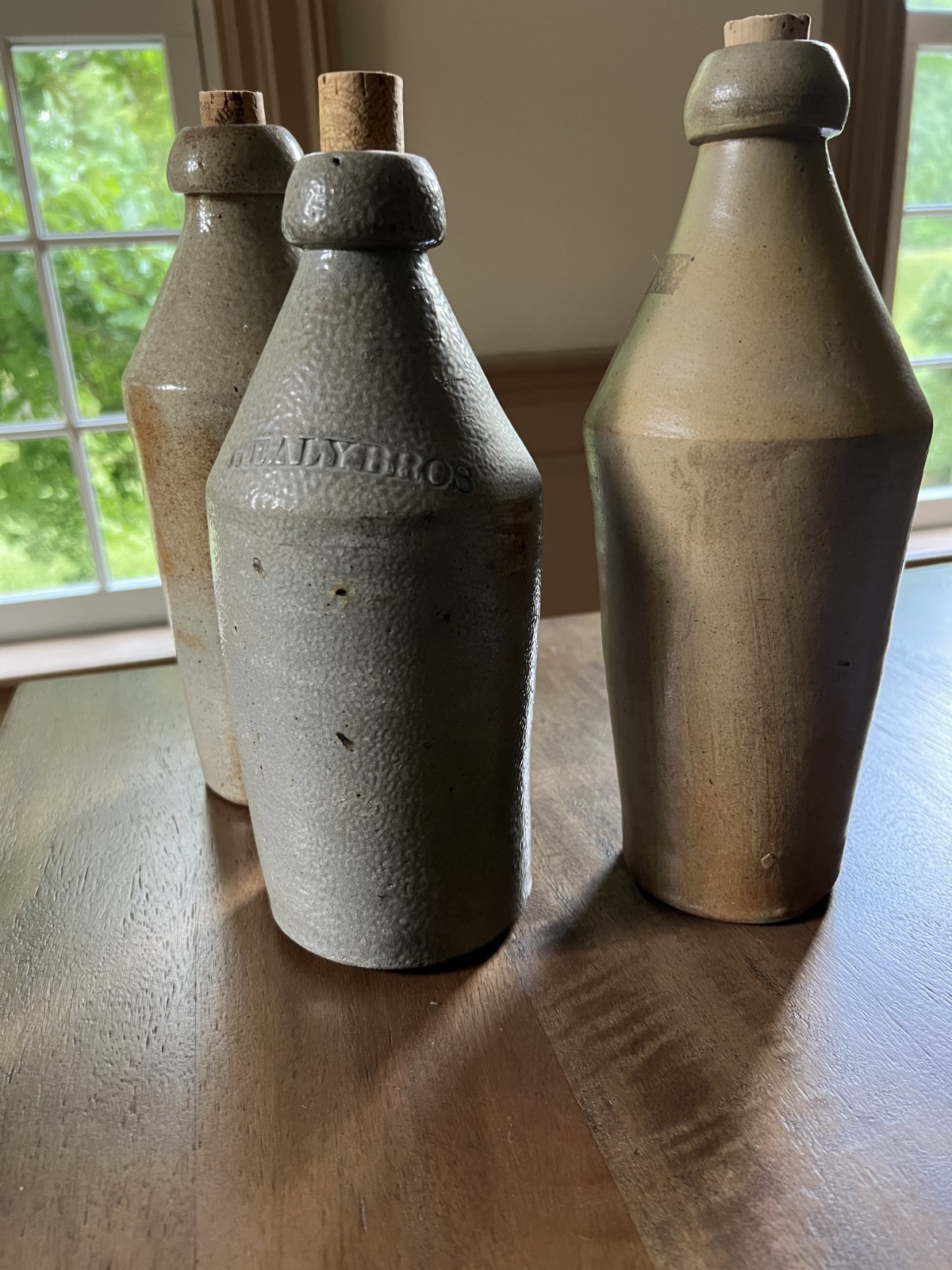 Antique Healy Bros Stoneware Pop Bottles Antique Healy Bros Stoneware Pop Bottles
