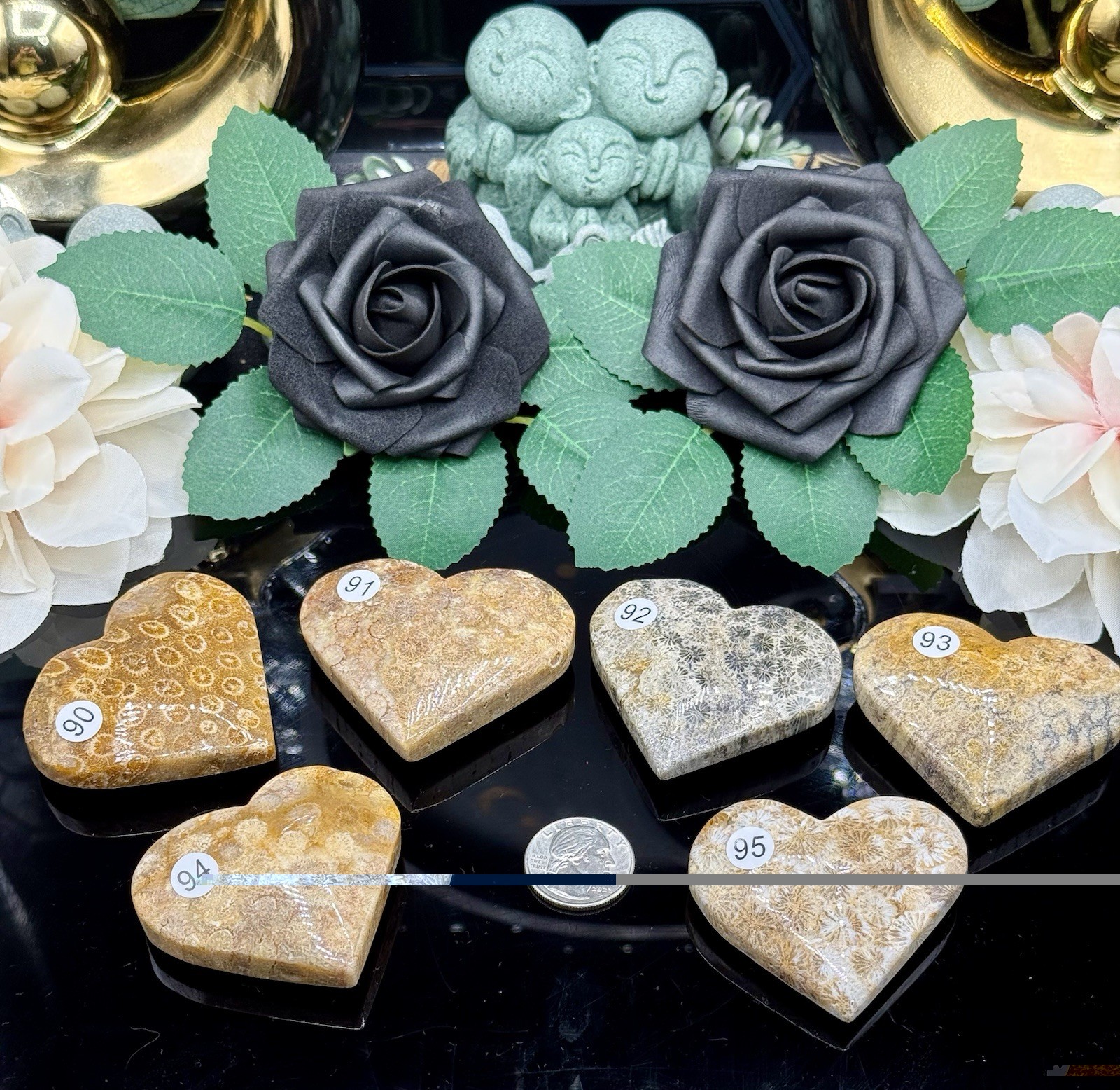 Natural Fossilized Coral Heart Carved Palm stones blues and golds 