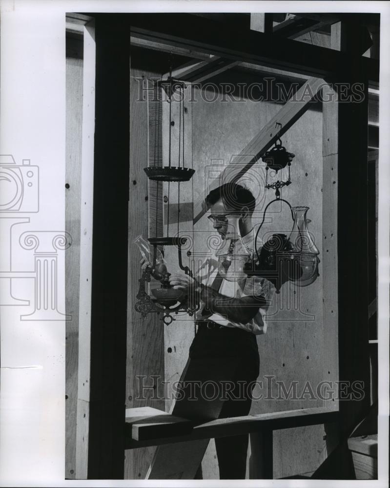 1953 Press Photo Donald Sachs installs antique lights, Milwaukee Museum 1953 Press Photo Donald Sachs installs antique lights, Milwaukee Museum