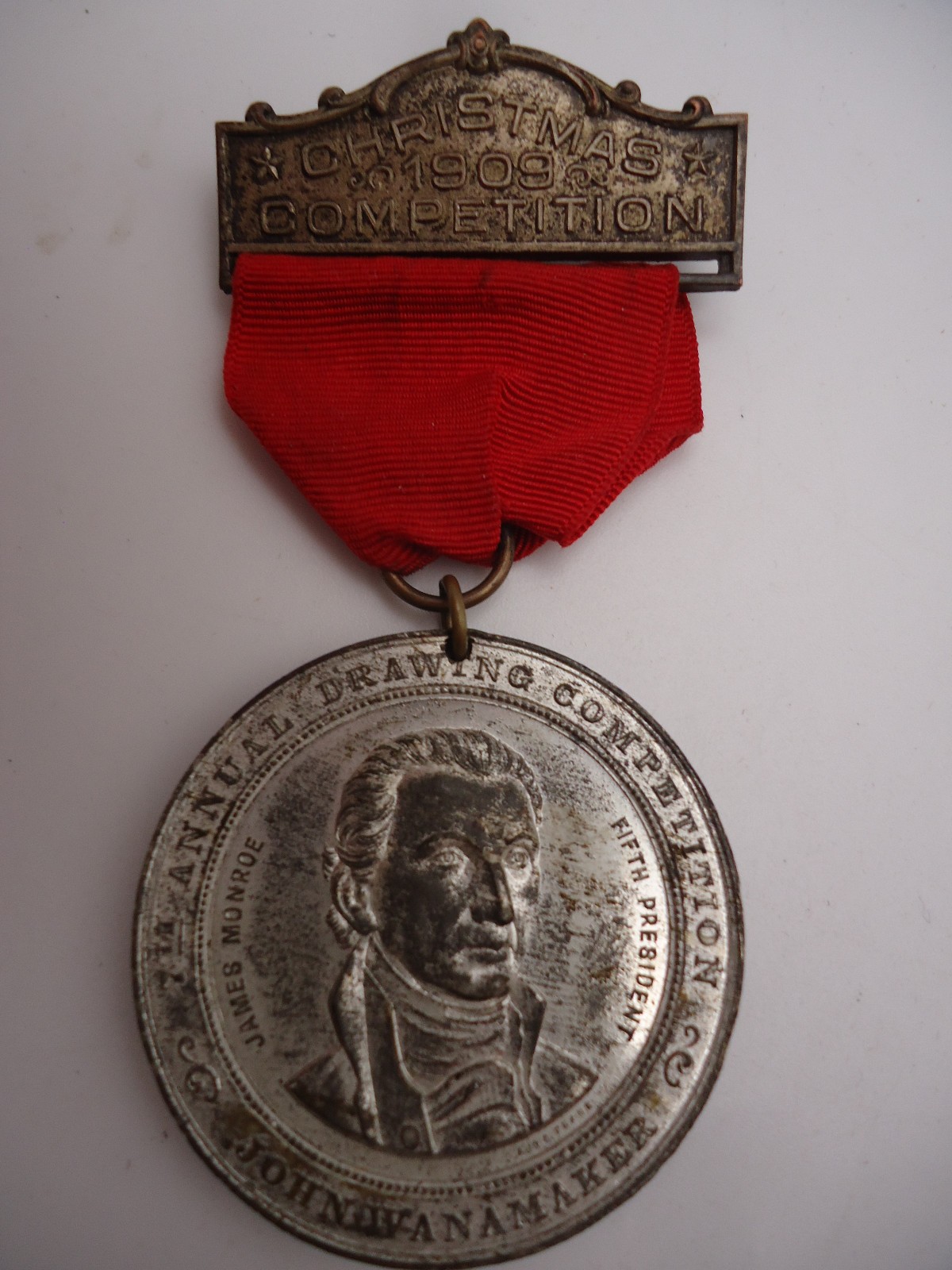 1909 John Wanamaker Childrens Christmas Drawing Competition Medal - James Monroe 1909 John Wanamaker Childrens Christmas Drawing Competition Medal - James Monroe