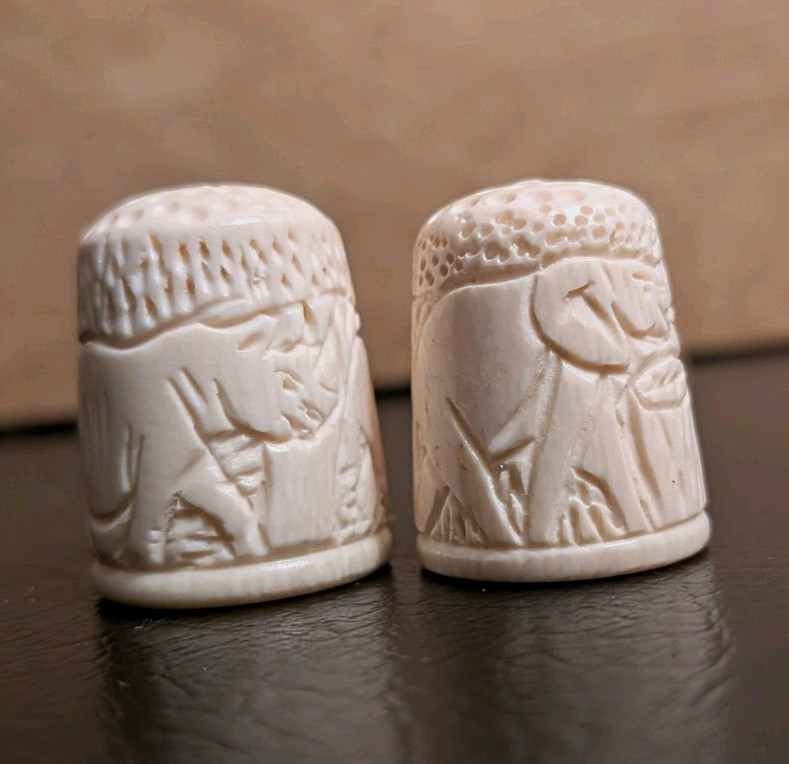 Pair of White Carved Bovine Bone Scene Sewing Thimbles, Saharan Animal Motif