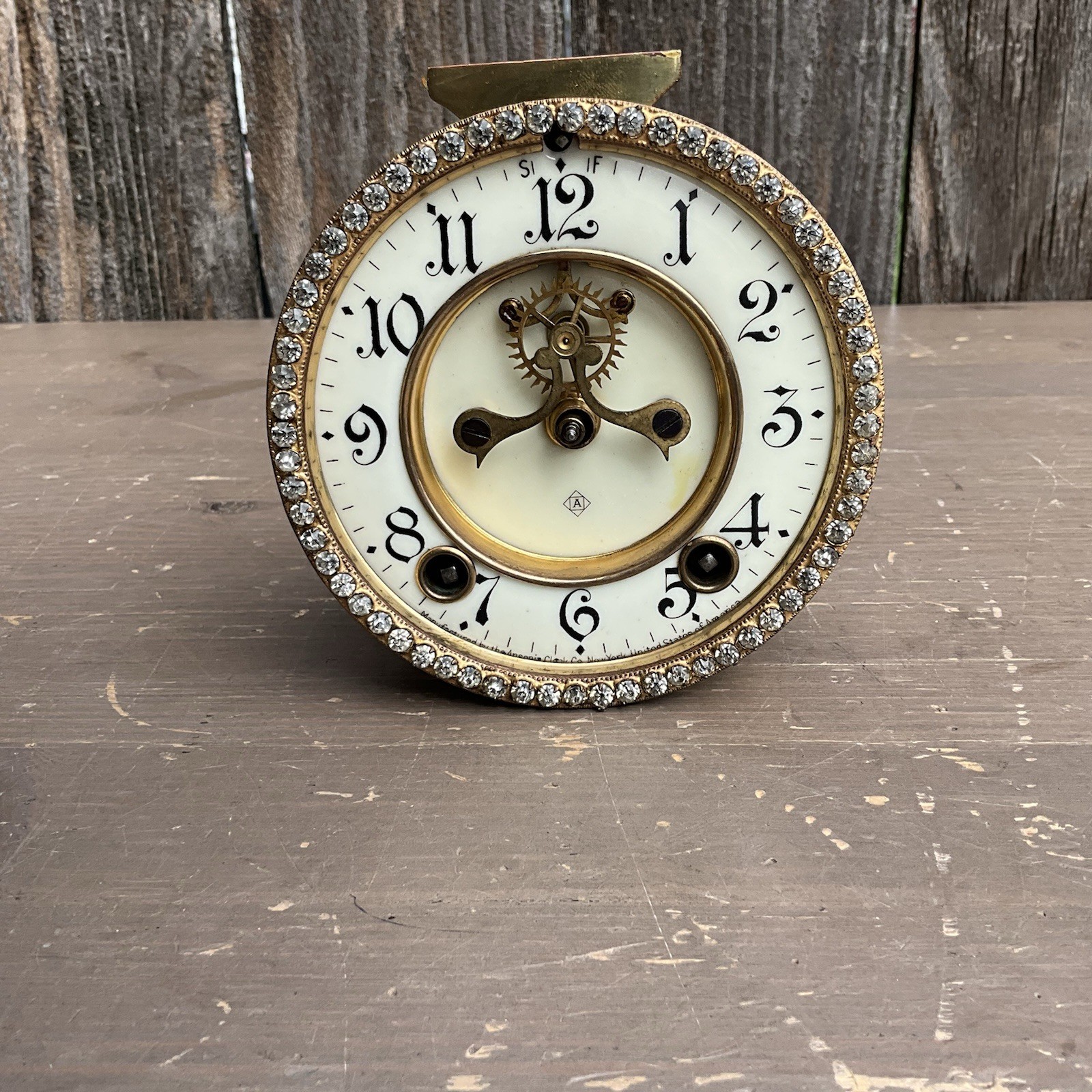 ansonia crystal regulator fancy diamond bezel movement , open escapement , runs