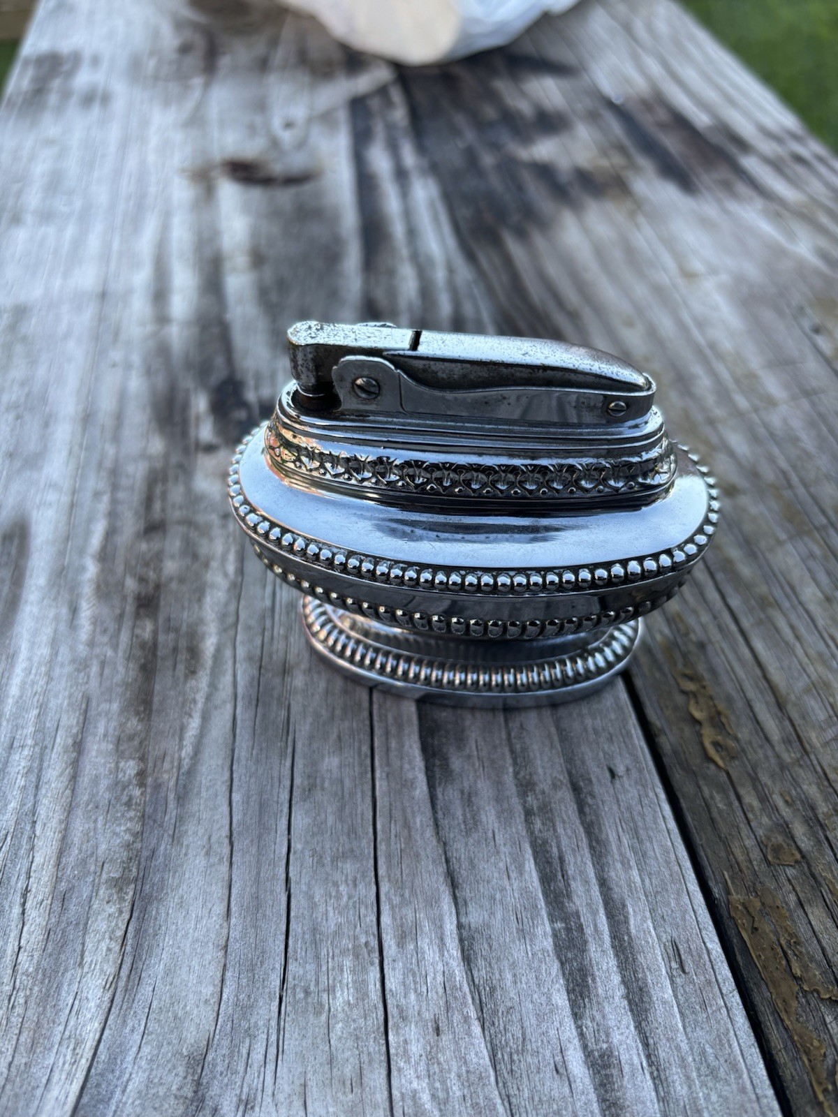 a vintage TAC brand table lighter made in Japan.