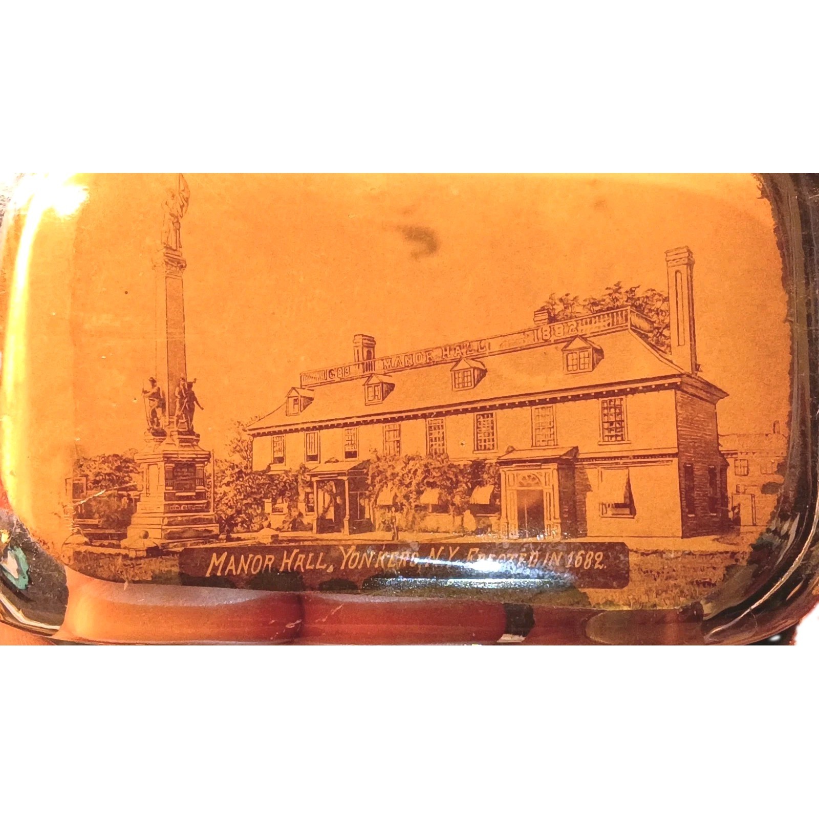 antique glass paperweight of Manor Hall in Yonkers, New York (built in 1682)
