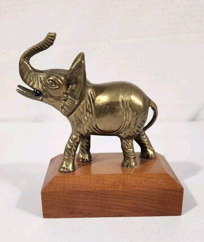 vintage brass elephant figurine On Wooden Stand Trunk Up 