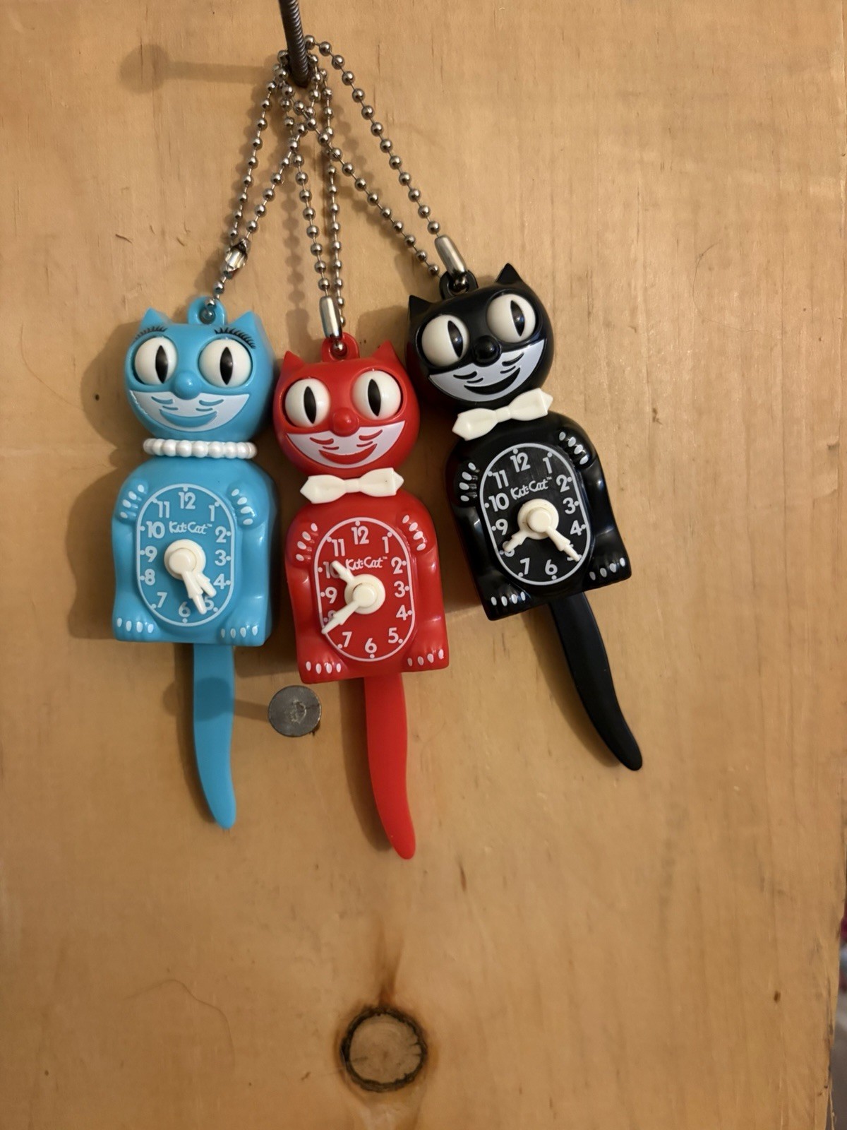kit cat clock keychains very cool if you move tail eyes move back and forth