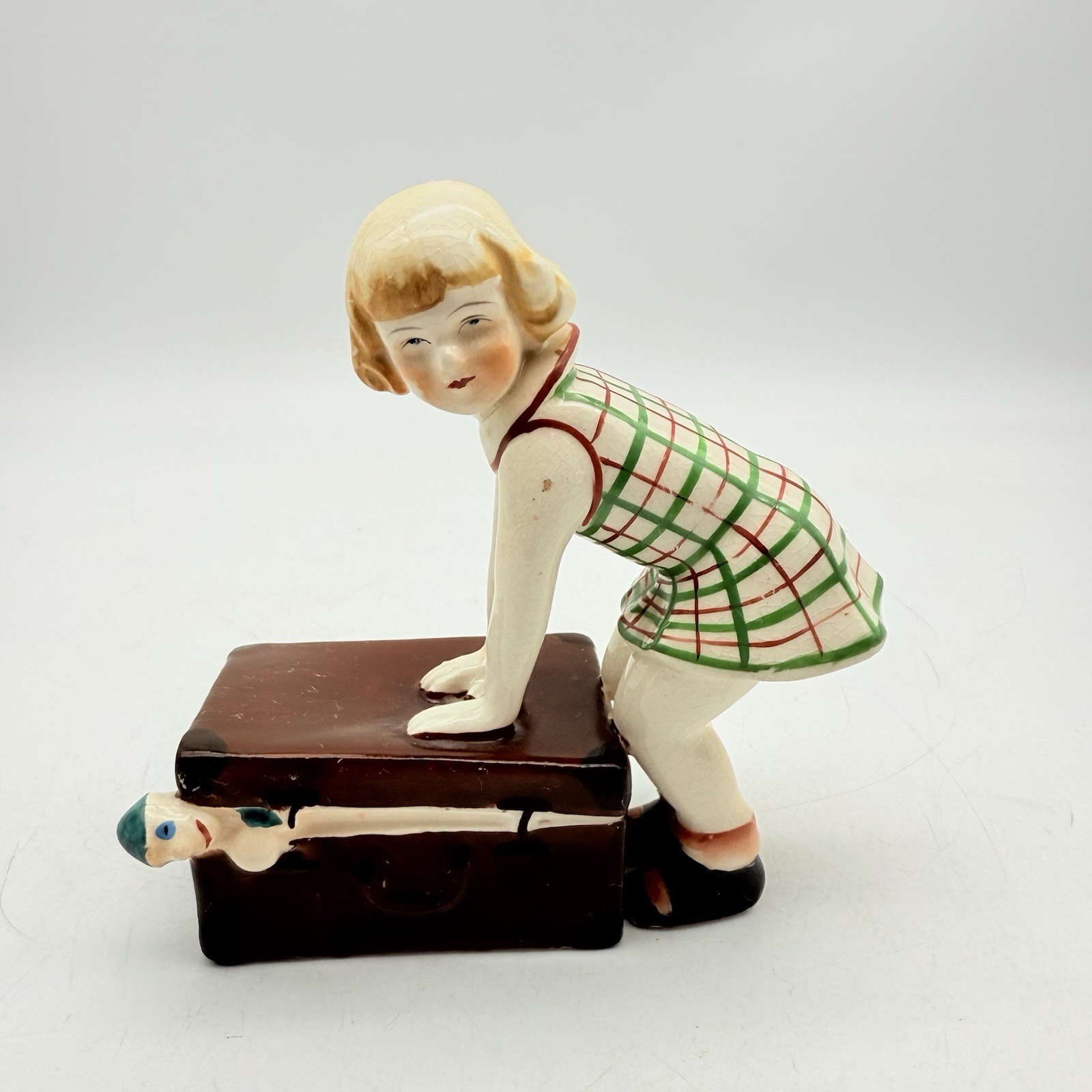1950s “Little Girl Closing Suitcase” Japanese Copy of Dakon Sculpture Porcelain