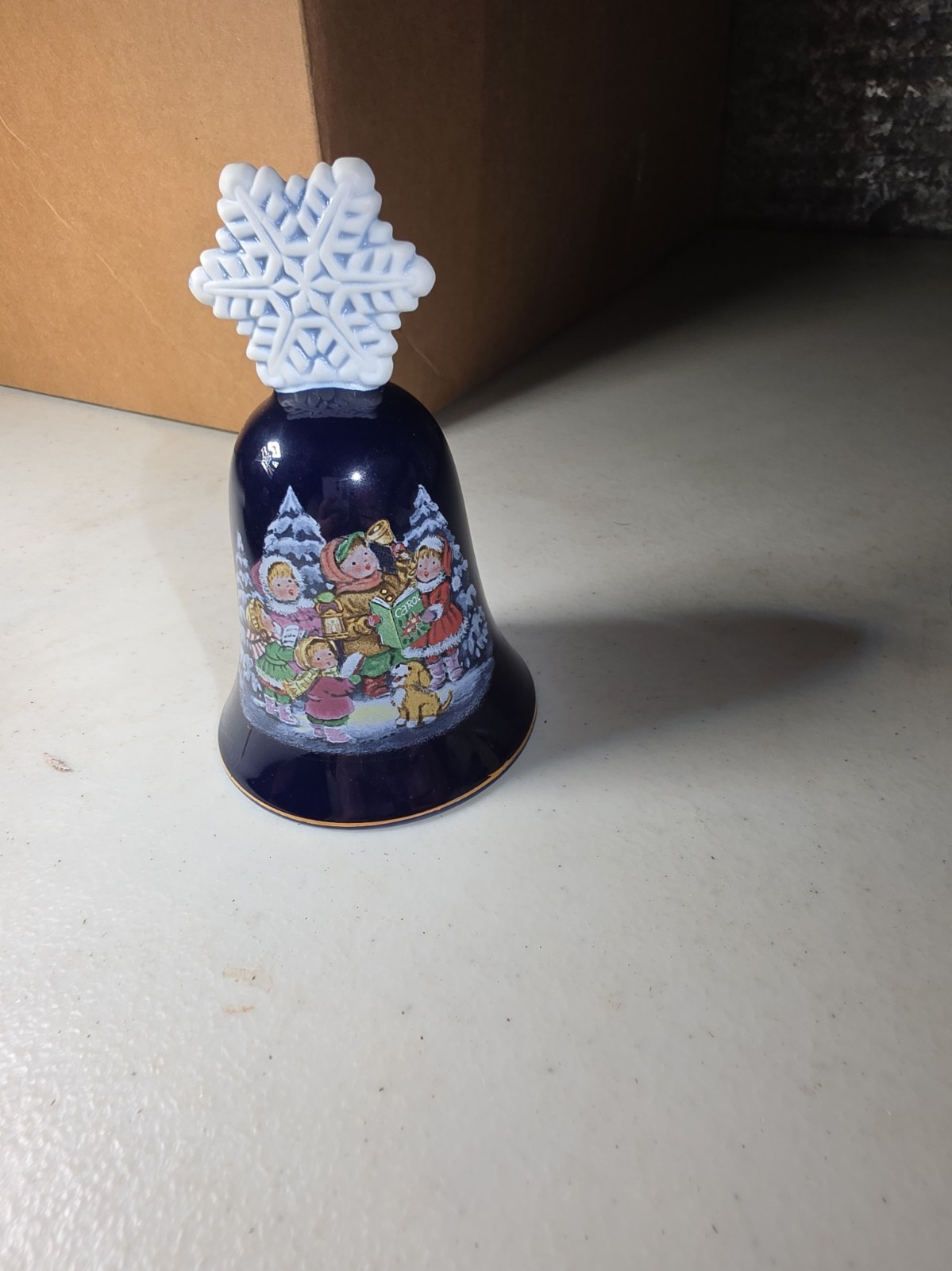 Vintage Avon Christmas Porcelain Bell Cobalt Blue children singing 1987 