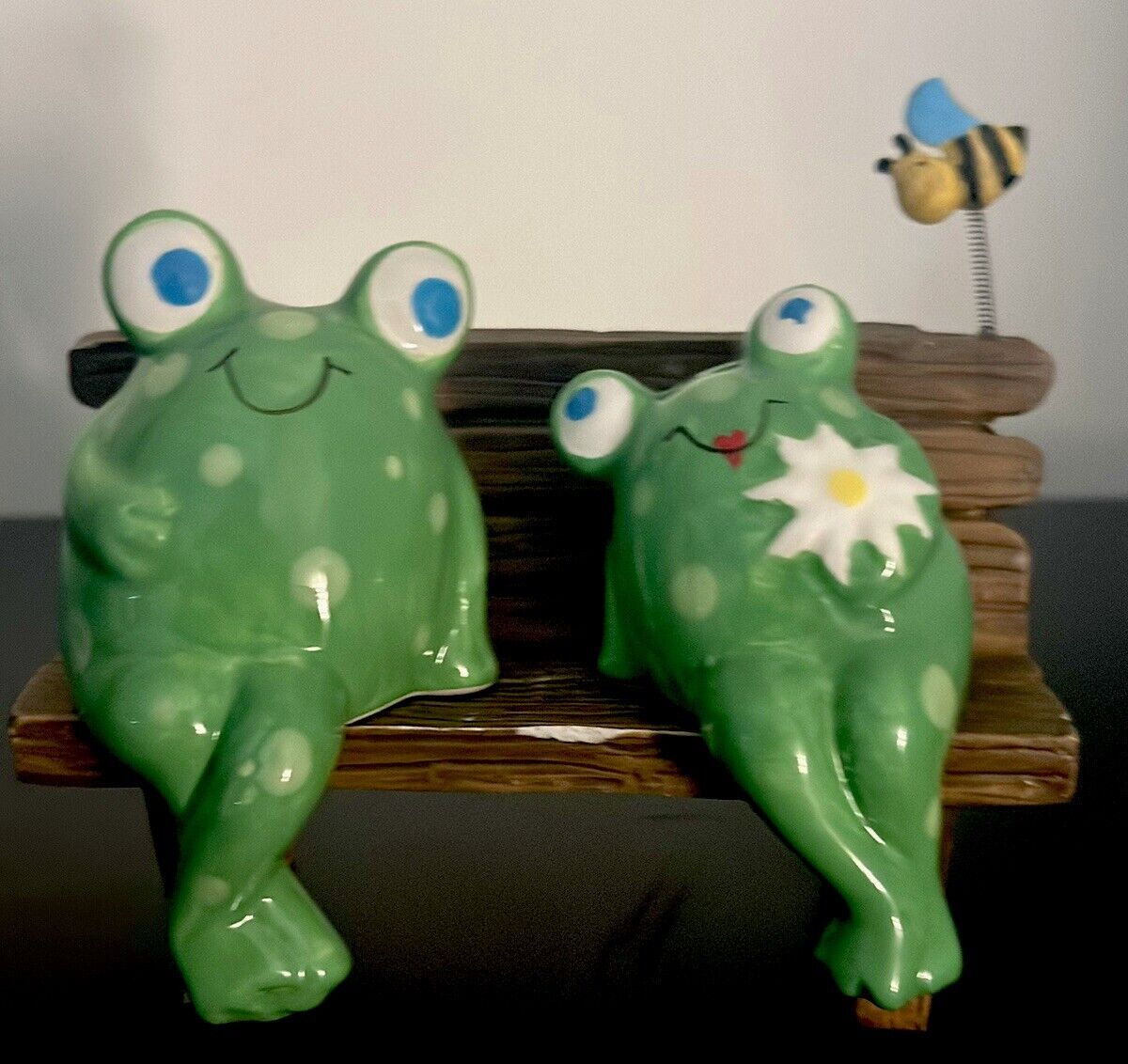 Super Cute Sweetheart Frogs Salt and Pepper Set sitting on Bench with Bee