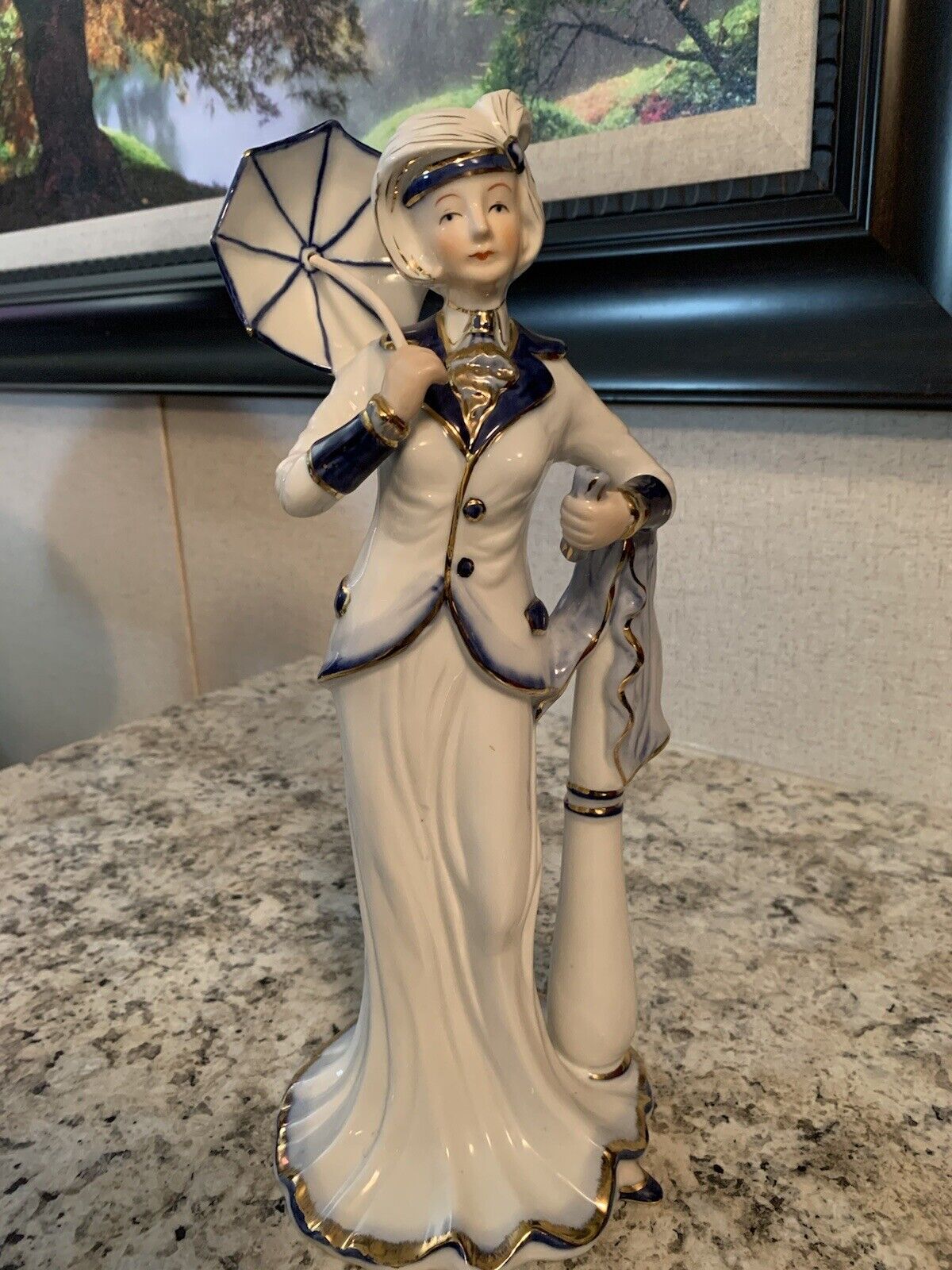 Large vintage porcelain Figurine by KPM, Blue a And White Lady With Umbrella