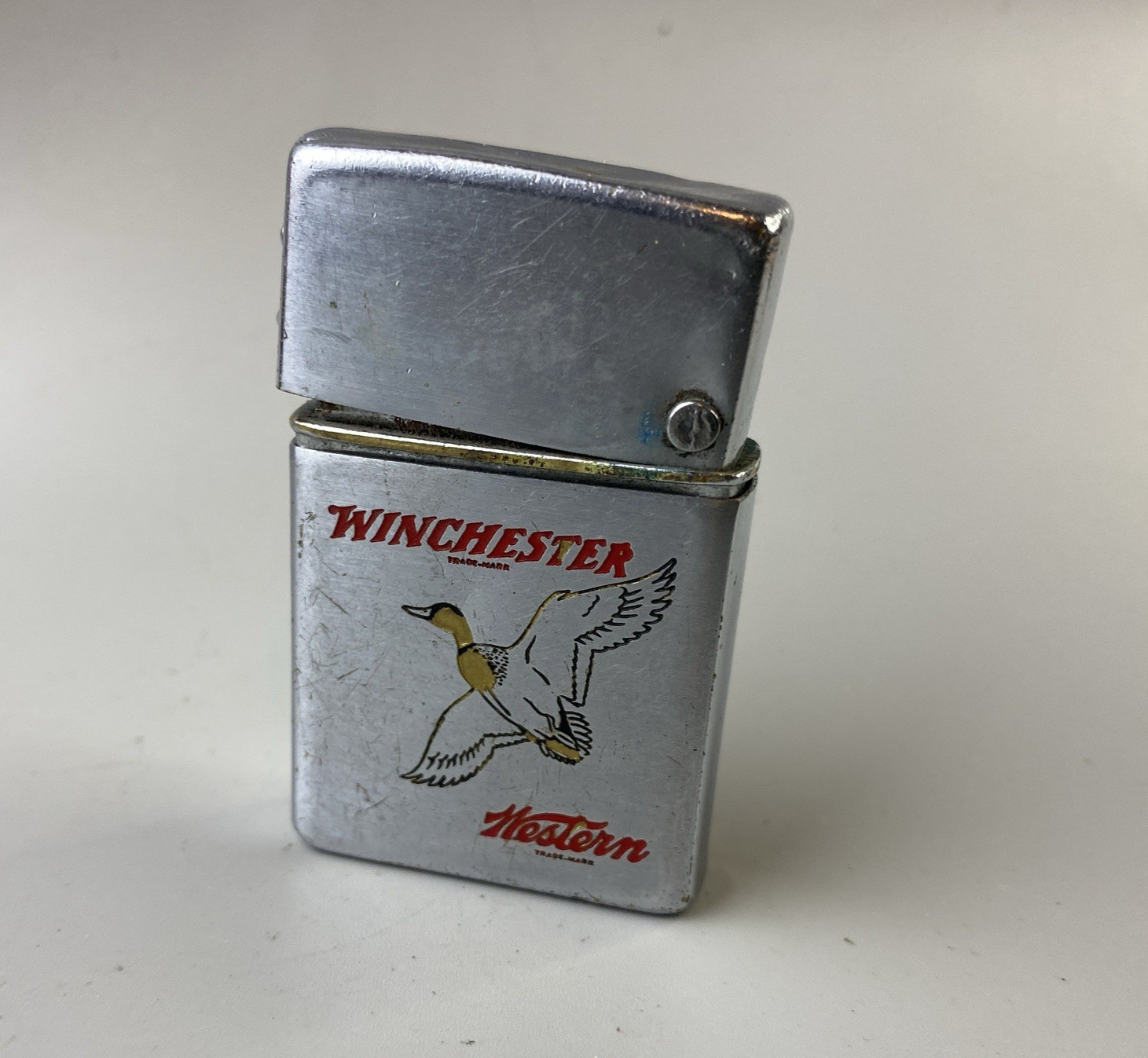 Winchester Western Rifles  Brown & Bigelow Wind Master Lighter 1950s Rare