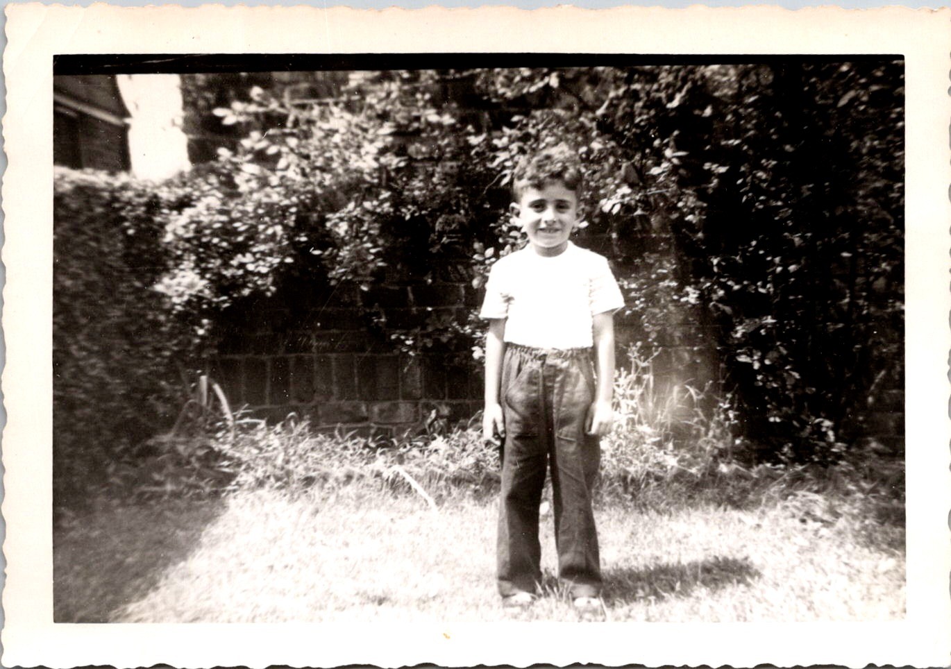 Smiling Young Boy in Backyard Garden, July 1950 Vintage Snapshot Photo