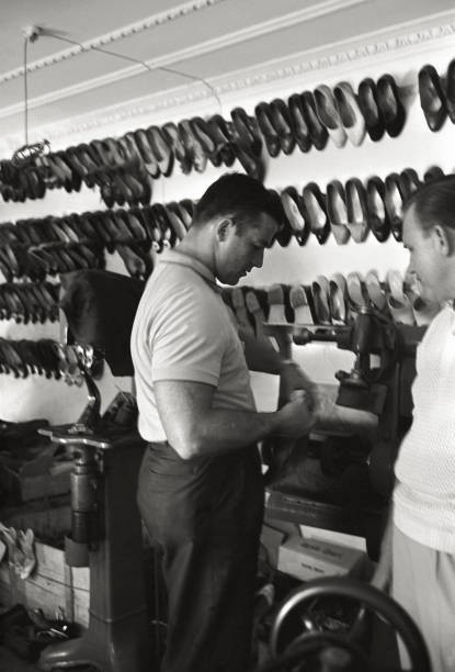 The American hammer thrower Harold Connolly trying a machinery a s- Old Photo
