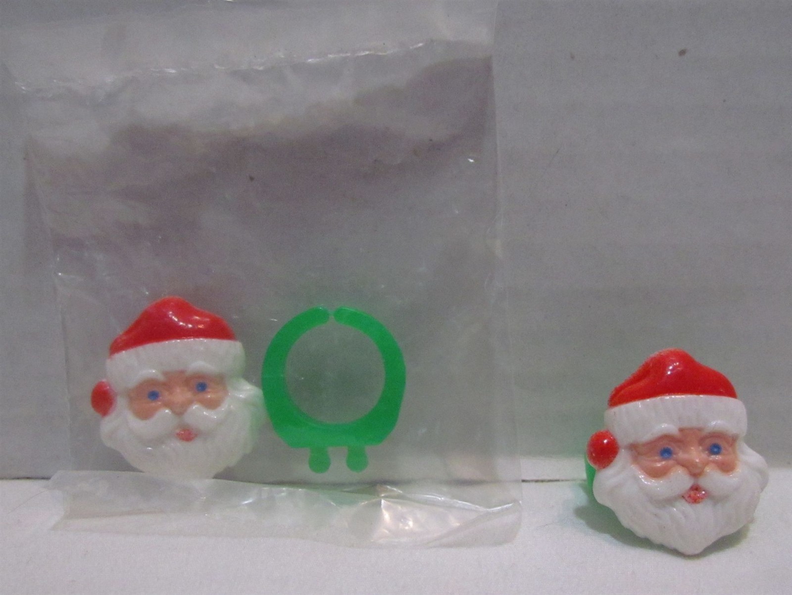 Two 1960\'s Sears Santa Claus Premium Ring, One Mint in Pack