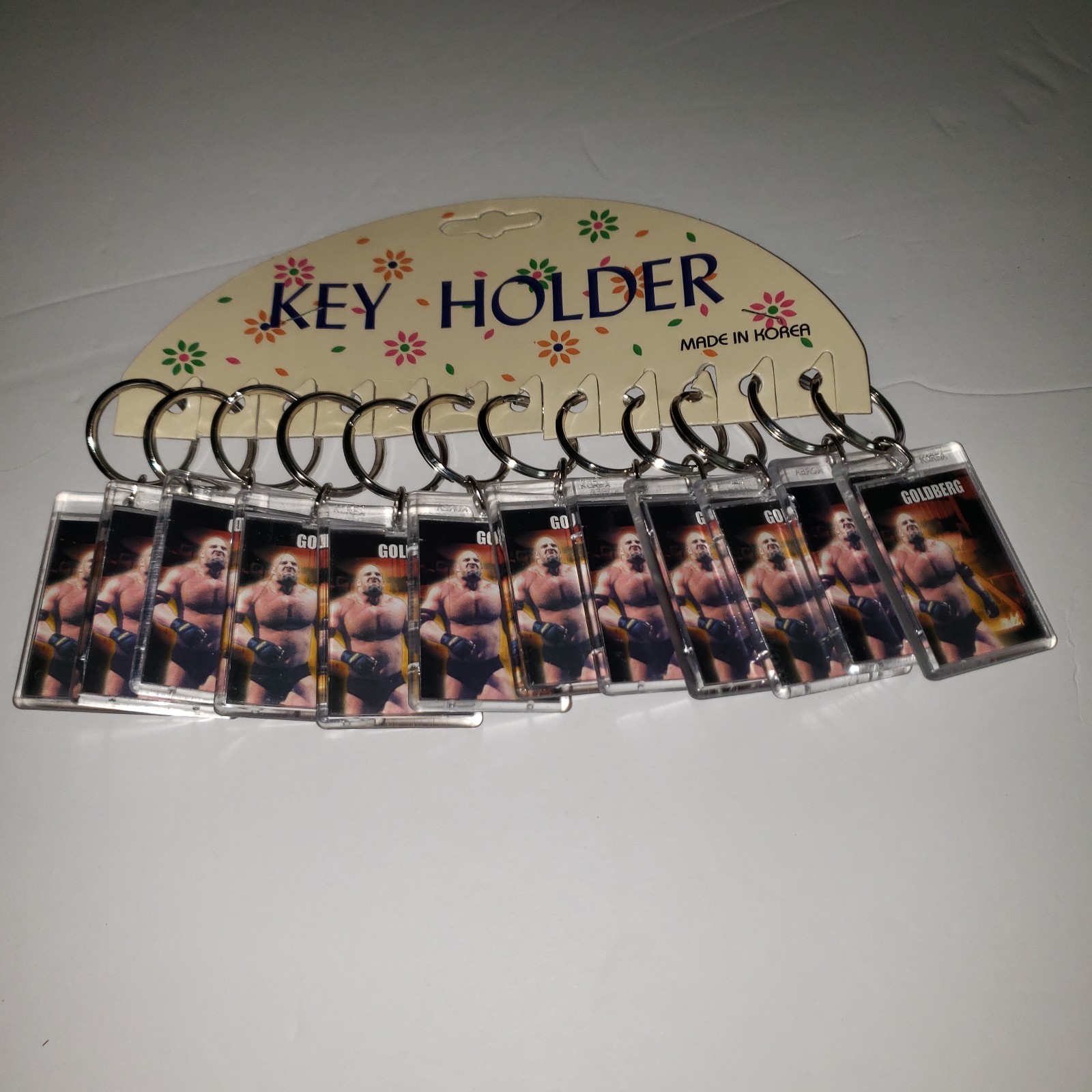 Vintage New Old Stock Lot Of 12 WCW NWO Late 90s Goldberg Keychains