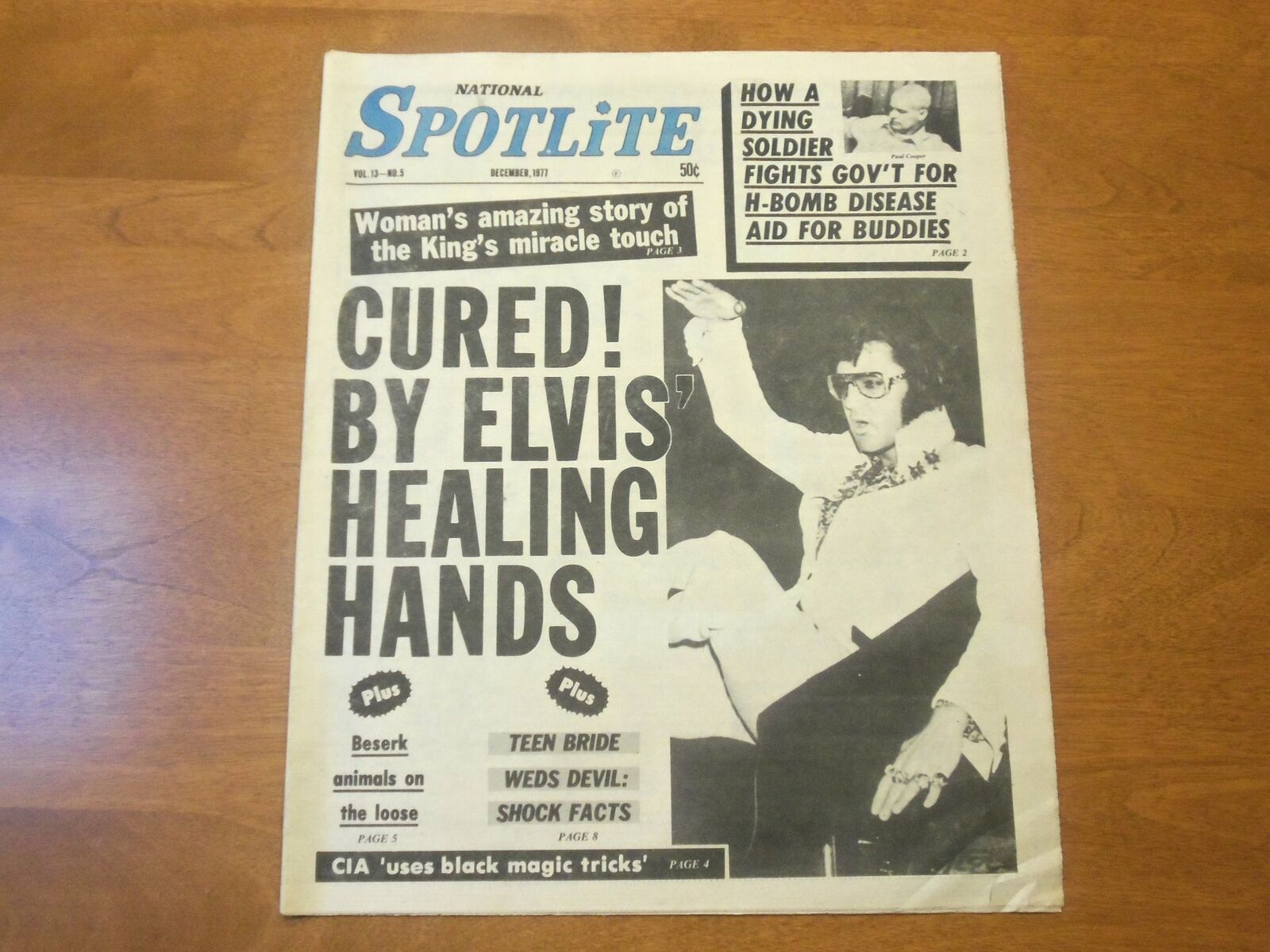 1977 DECEMBER NATIONAL SPOTLITE NEWSPAPER - CURED BY ELVIS\' HANDS - NP 4771