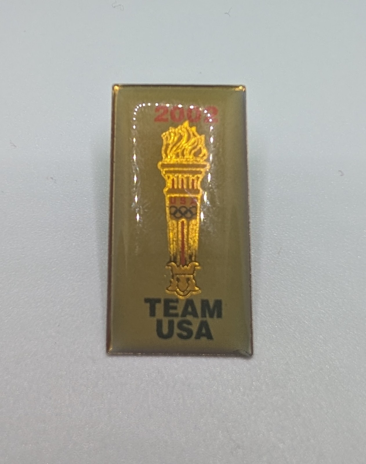 2002 Team USA Olympic Torch Gold Tone Anniversary Lapel Pin 2002 Team USA Olympic Torch Gold Tone Anniversary Lapel Pin