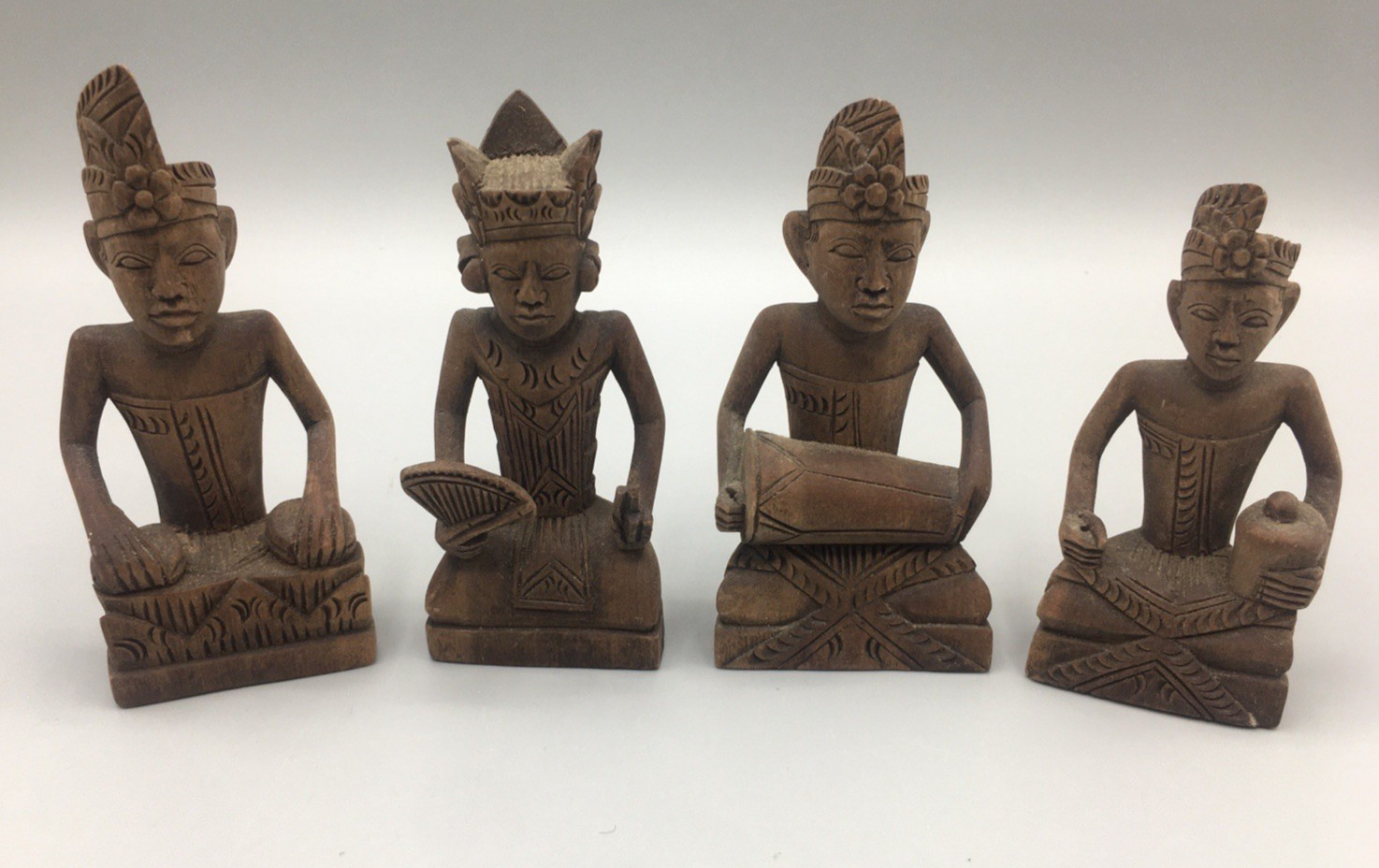 4 Balinese Hand Carved Wooden Men 3.75-4.5\ 4 Balinese Hand Carved Wooden Men 3.75-4.5\