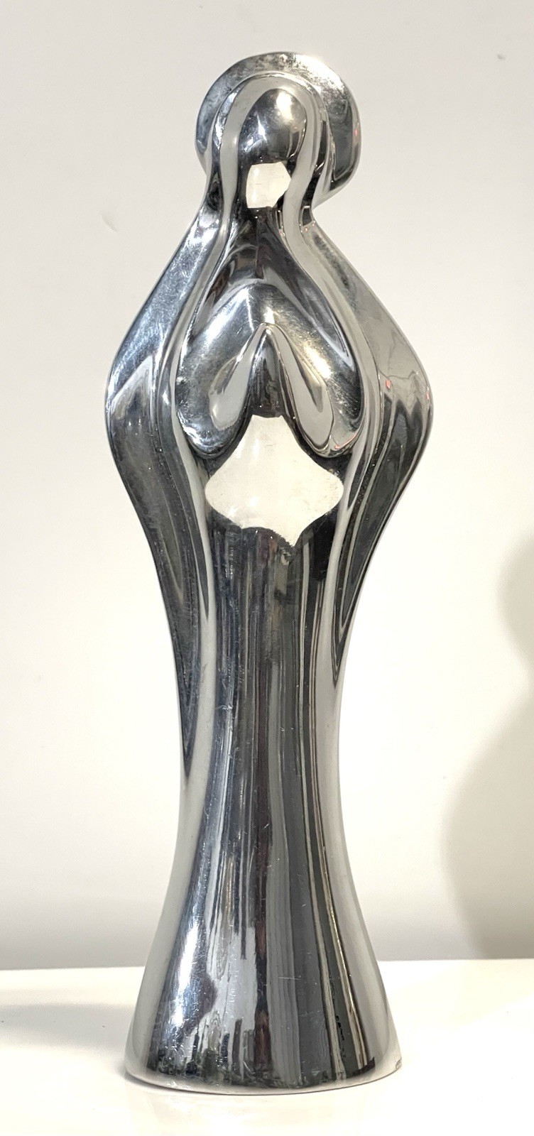 Nambe Polished Aluminum Madonna Designed by Alvaro Uribe Nambe Polished Aluminum Madonna Designed by Alvaro Uribe