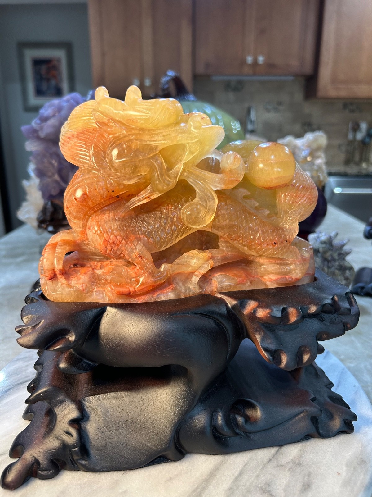 Dragon yellow Fluorite with gourd UV reactive carving with custom wood stand Dragon yellow Fluorite with gourd UV reactive carving with custom wood stand