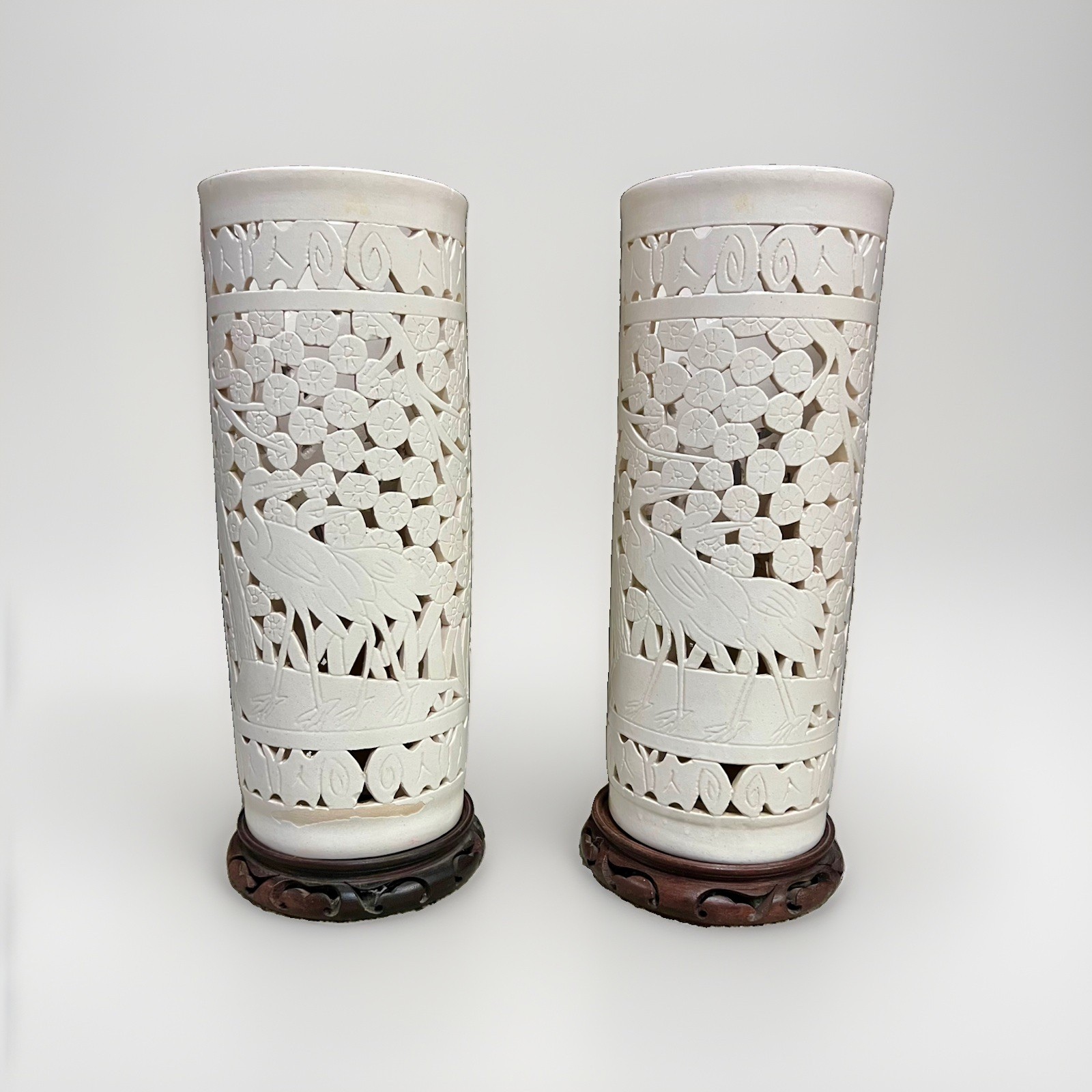 2 Vintage Blanc De Chine Chinese Reticulated Porcelain vases w/wood stands