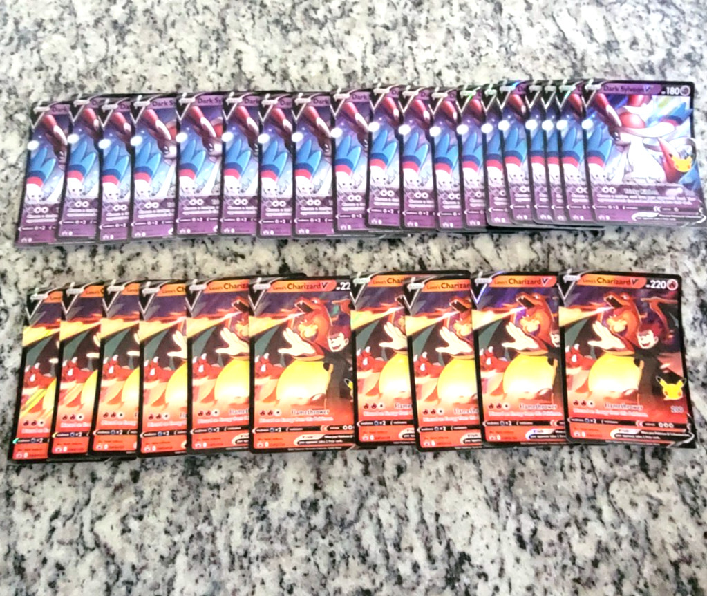 JUMBO Lance's Charizard V and Dark Sylveon Celebrations Promo Card Lot 28 cards JUMBO Lance's Charizard V and Dark Sylveon Celebrations Promo Card Lot 28 cards